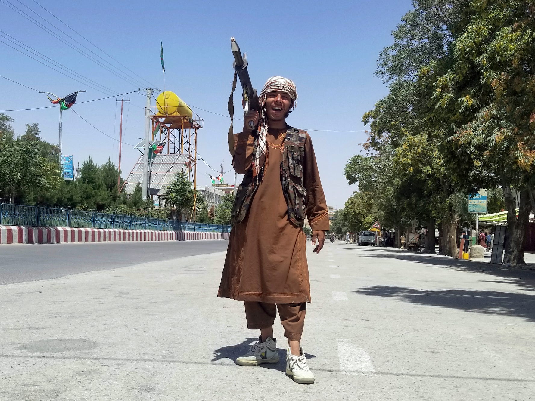 A Taliban fighter holding a weapon.