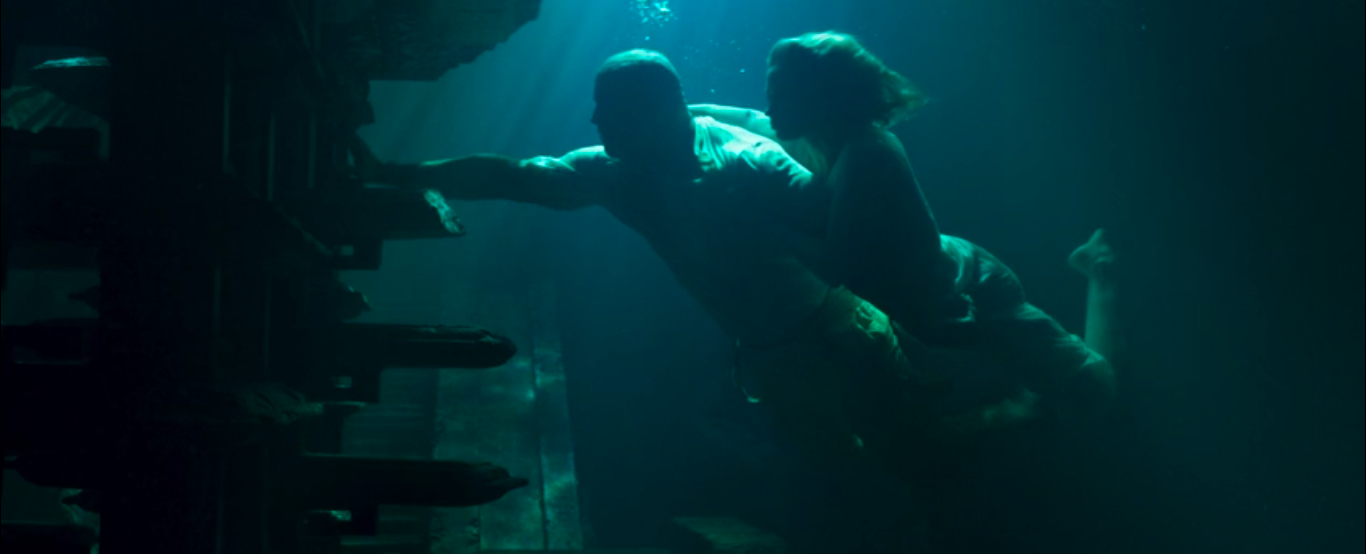 Dwayne Johnson and Emily Blunt underwater