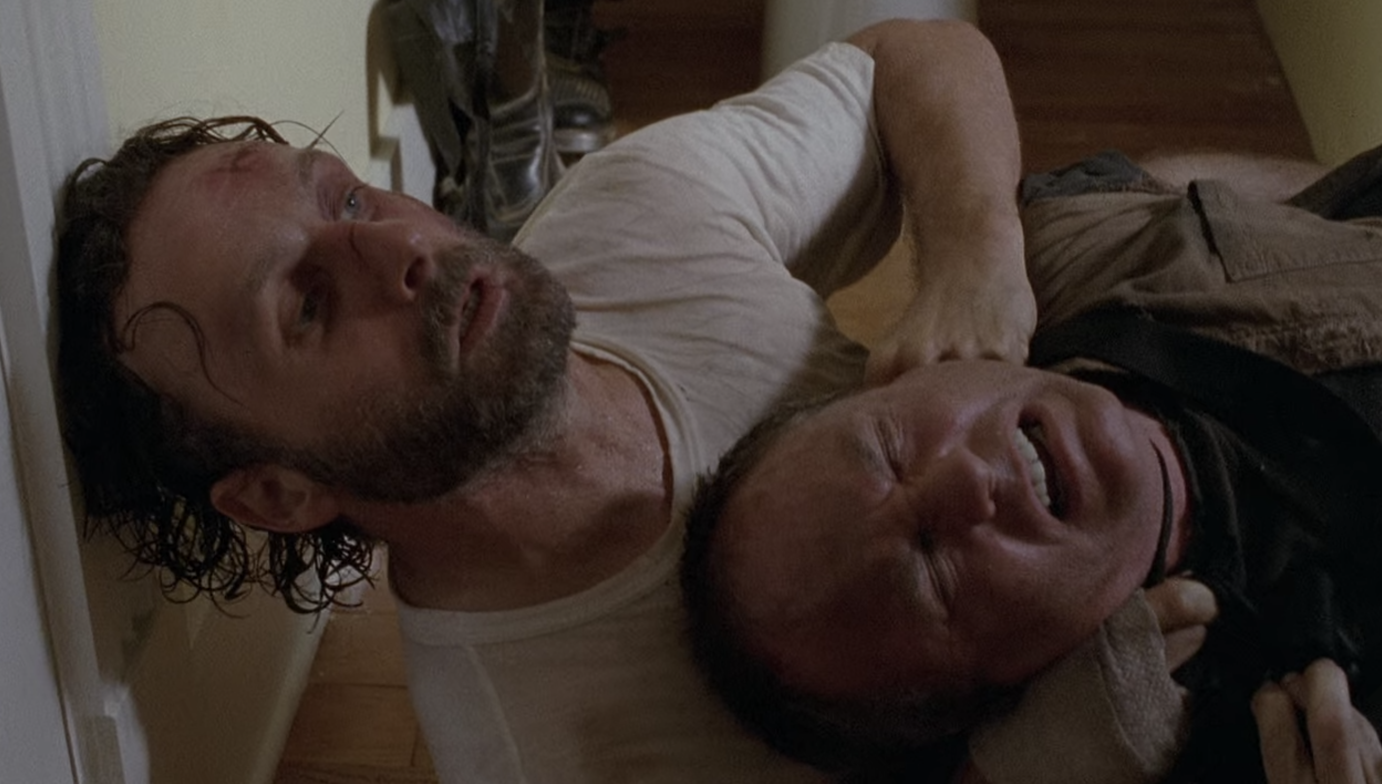 Rick strangles one of the members of the Claimers on season 4, episode 11. TWD 411