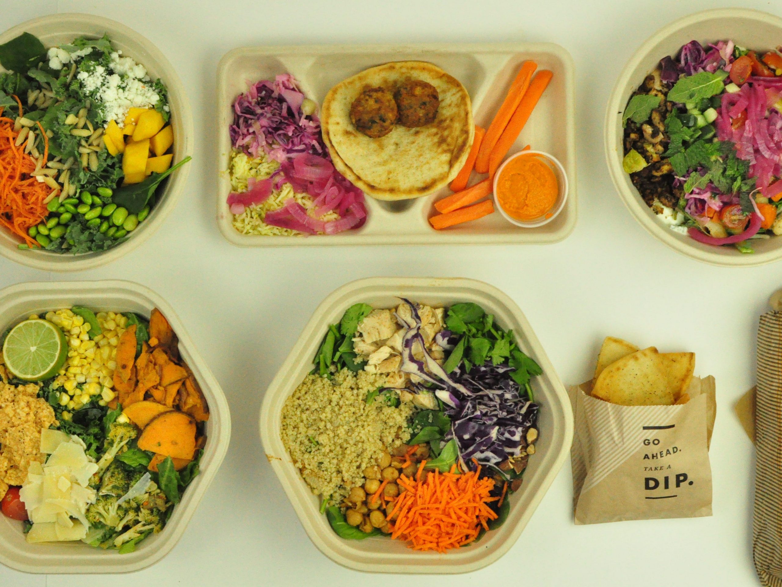 fast casual food packaging laid on a table