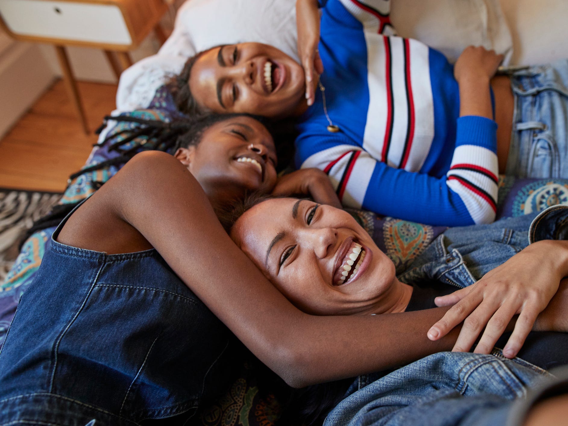 Three friends cuddling