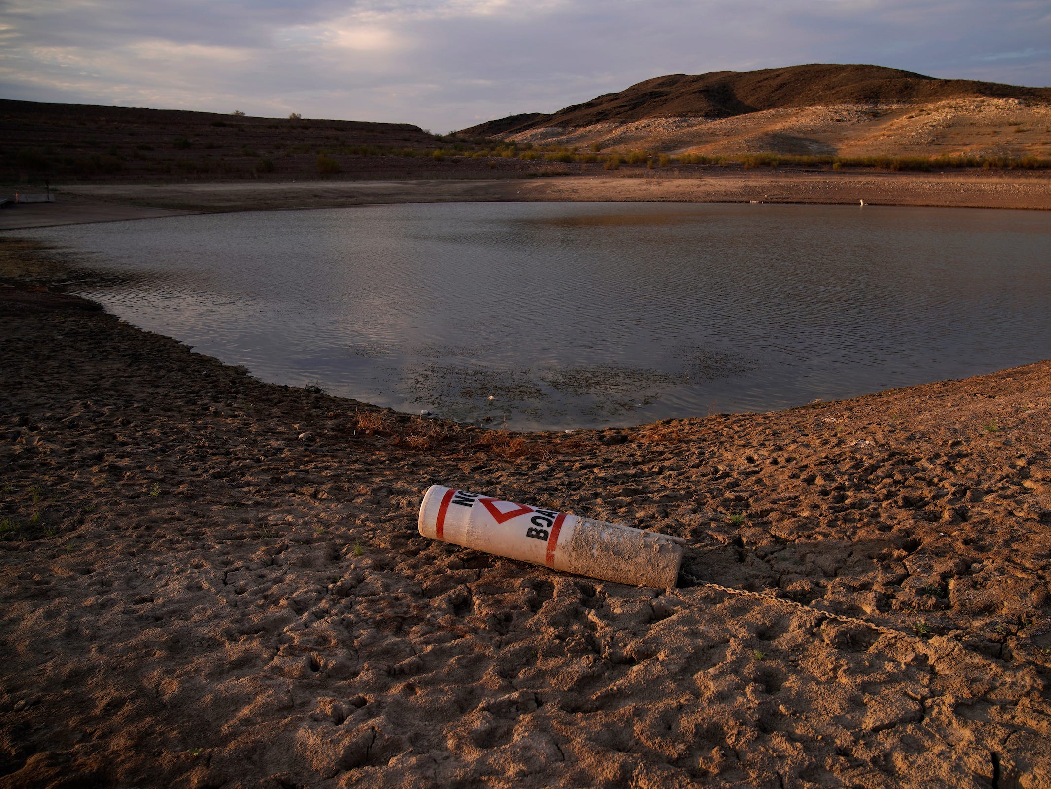 buoy on dry land next to lake mead