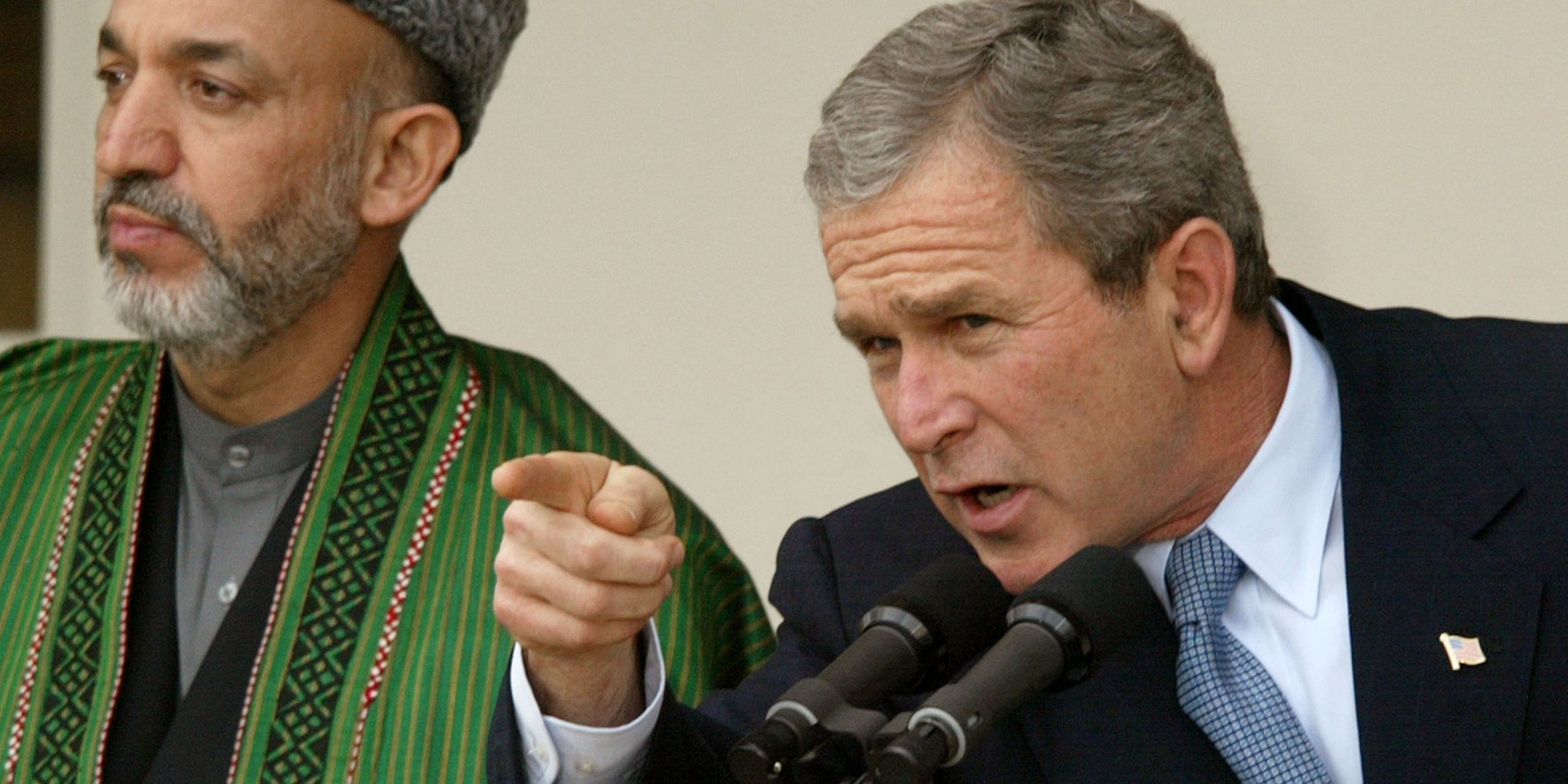 President George W. Bush seen with Afghanistan Interim Authority Chairman Hamid Karzai January 28, 2002