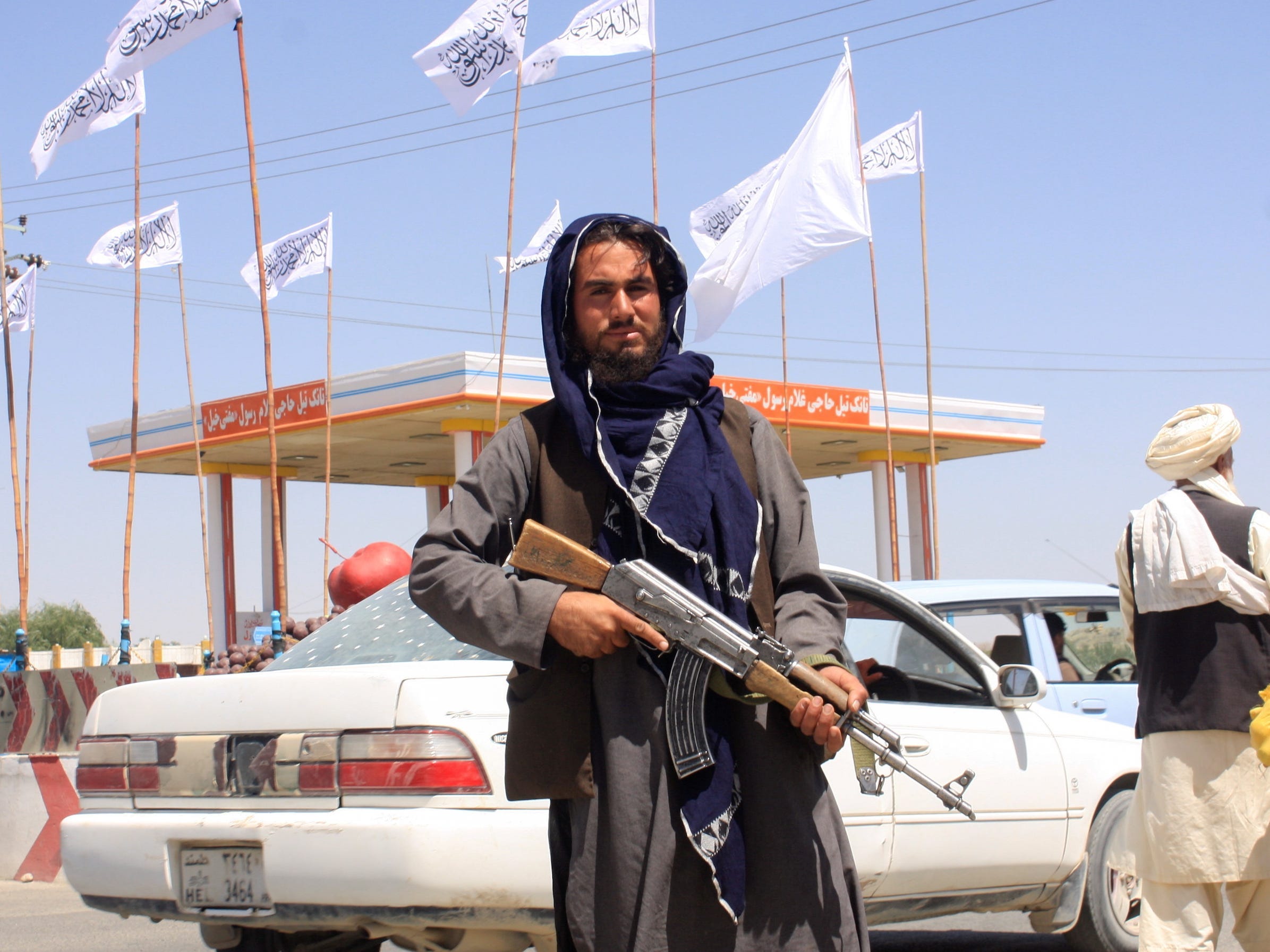 A Taliban fighter looks on as he stands at the city of Ghazni, Afghanistan August 14, 2021.