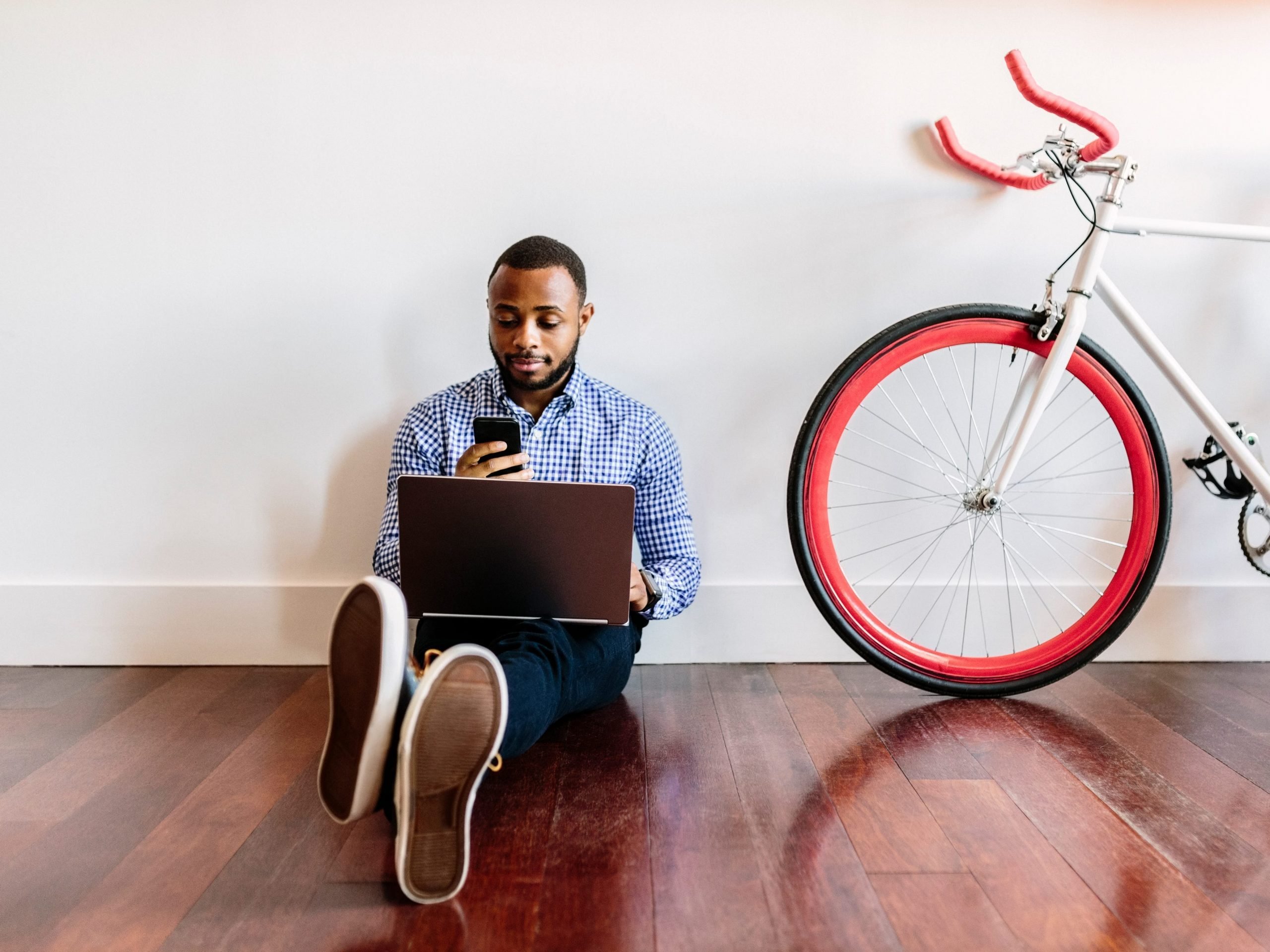 Man working from home with a bicycle.