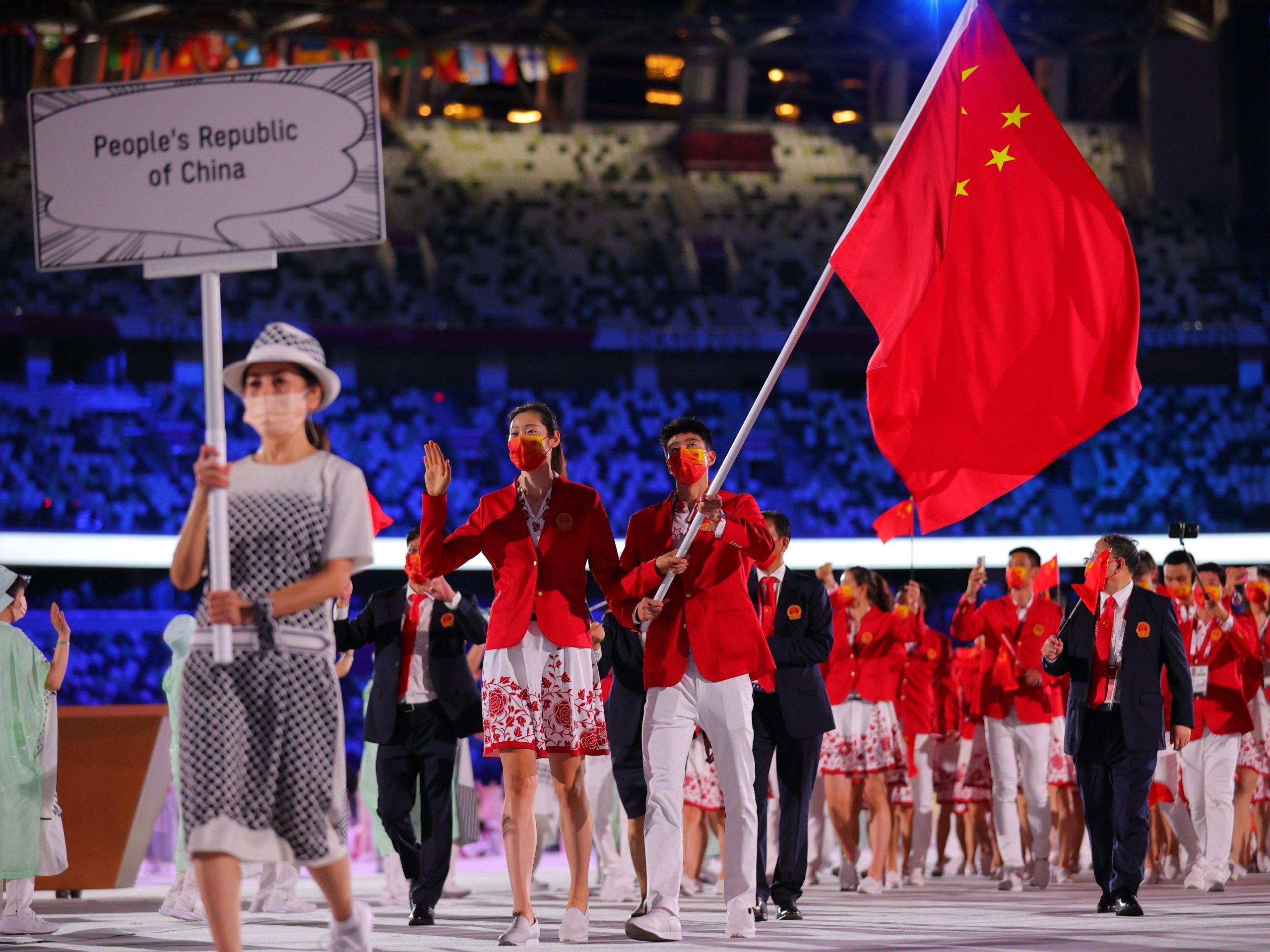 Led by flag bearers Zhu Ting 2nd L and Zhao Shuai 3rd L, the Olympic delegation of China parade into the Olympic Stadium during the opening ceremony of Tokyo 2020 Olympic Games