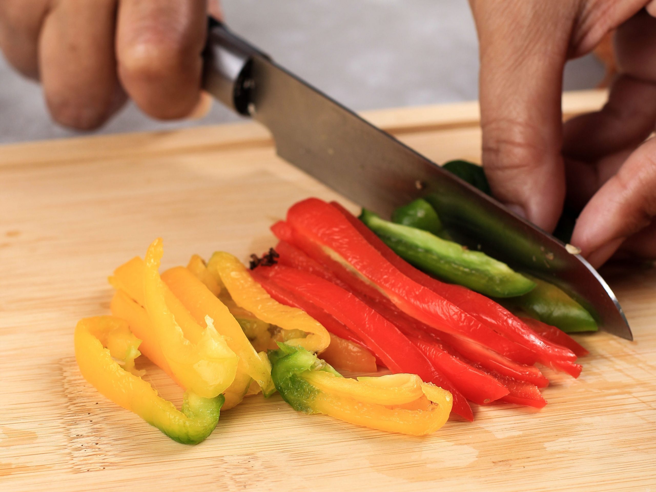 chopping peppers vegetables