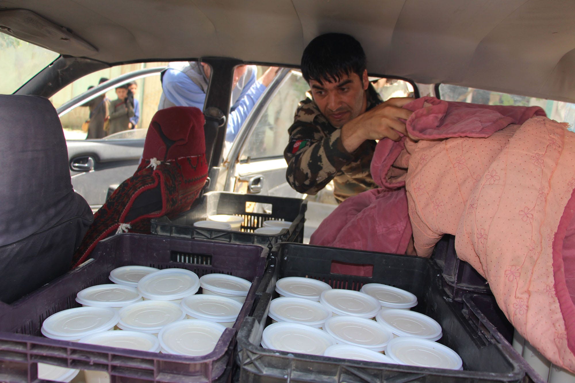 Afghanistan police check vehicle in Kunduz