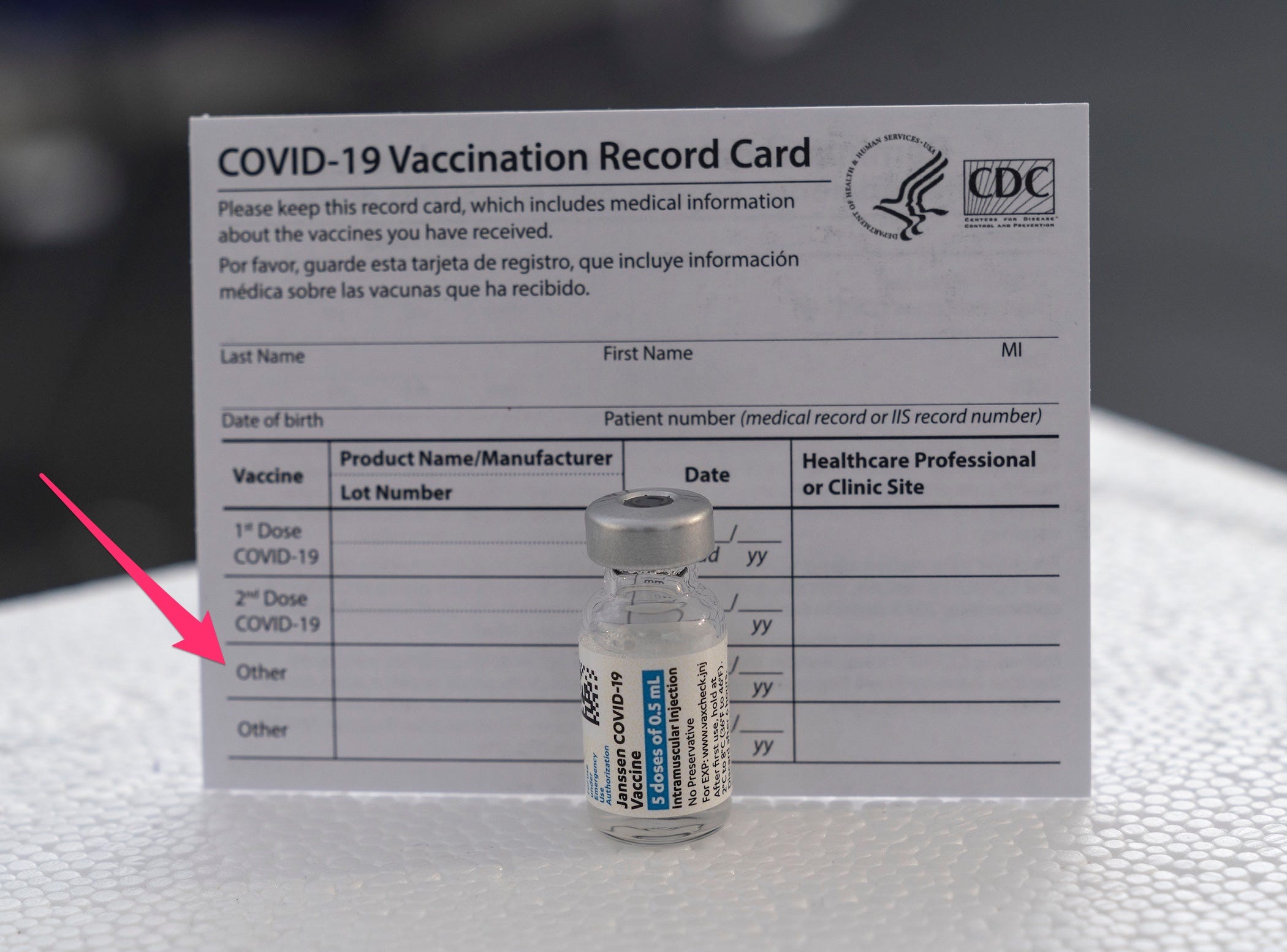 a cdc vaccine card with an arrow pointing at the line that says 'other' for additional doses of vaccines