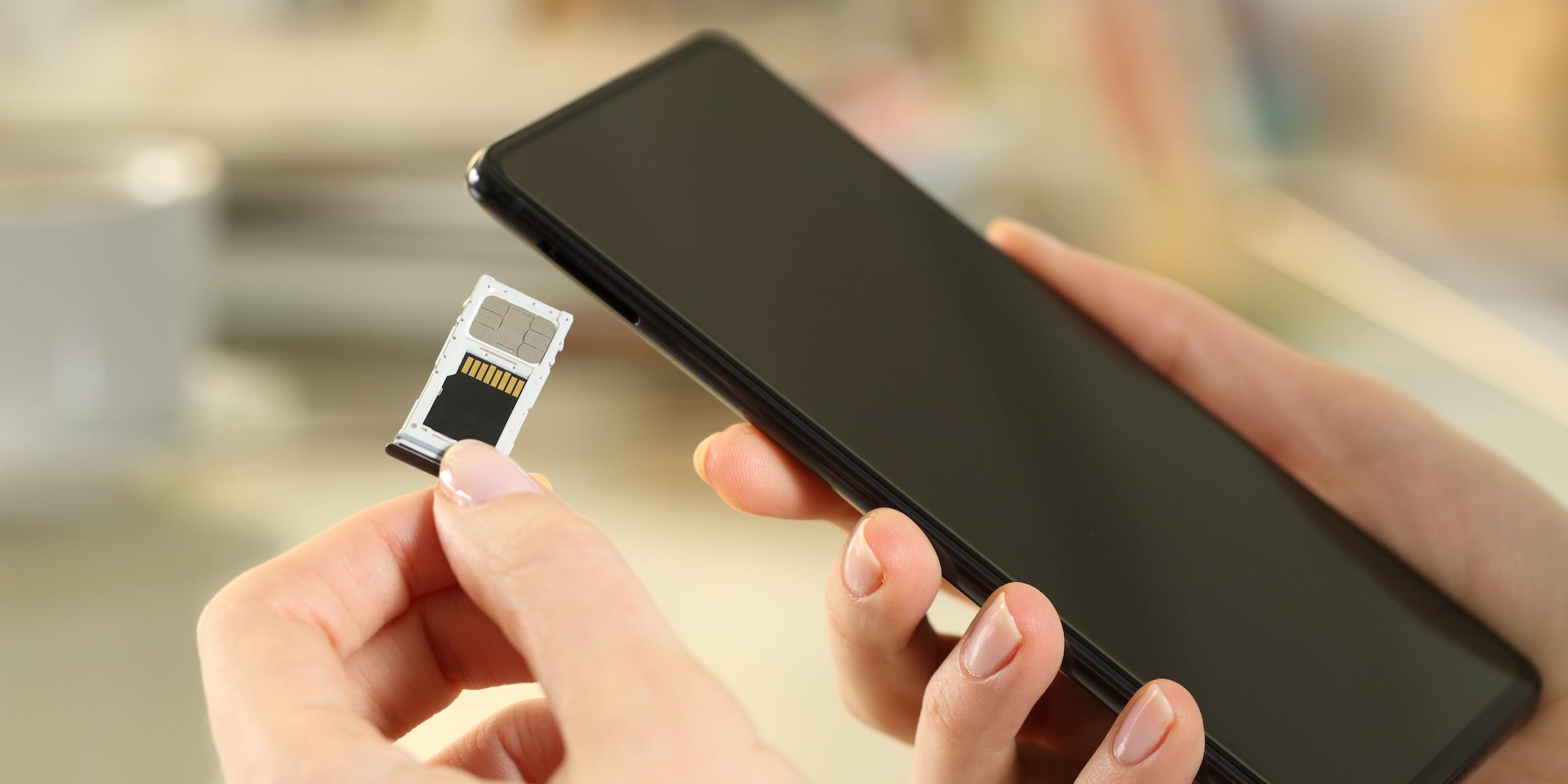 SIM card being inserted into Android phone