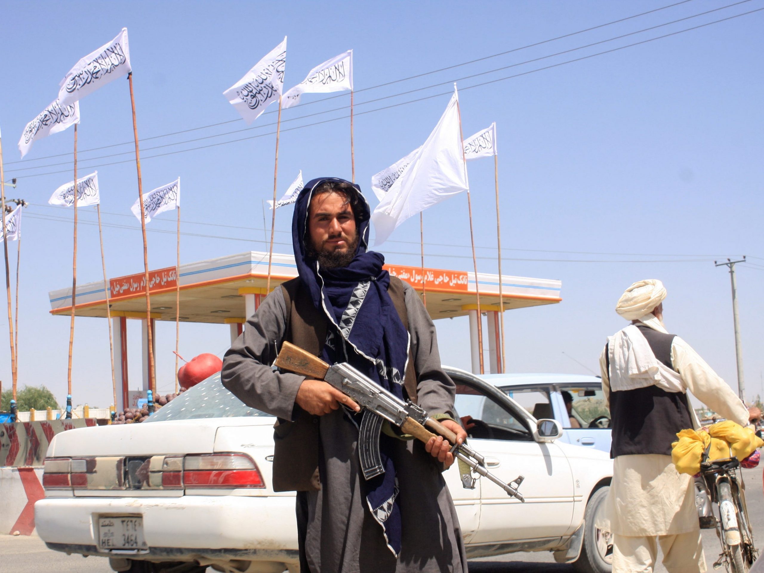 A Taliban fighter looks on as he stands at the city of Ghazni, Afghanistan August 14, 2021.