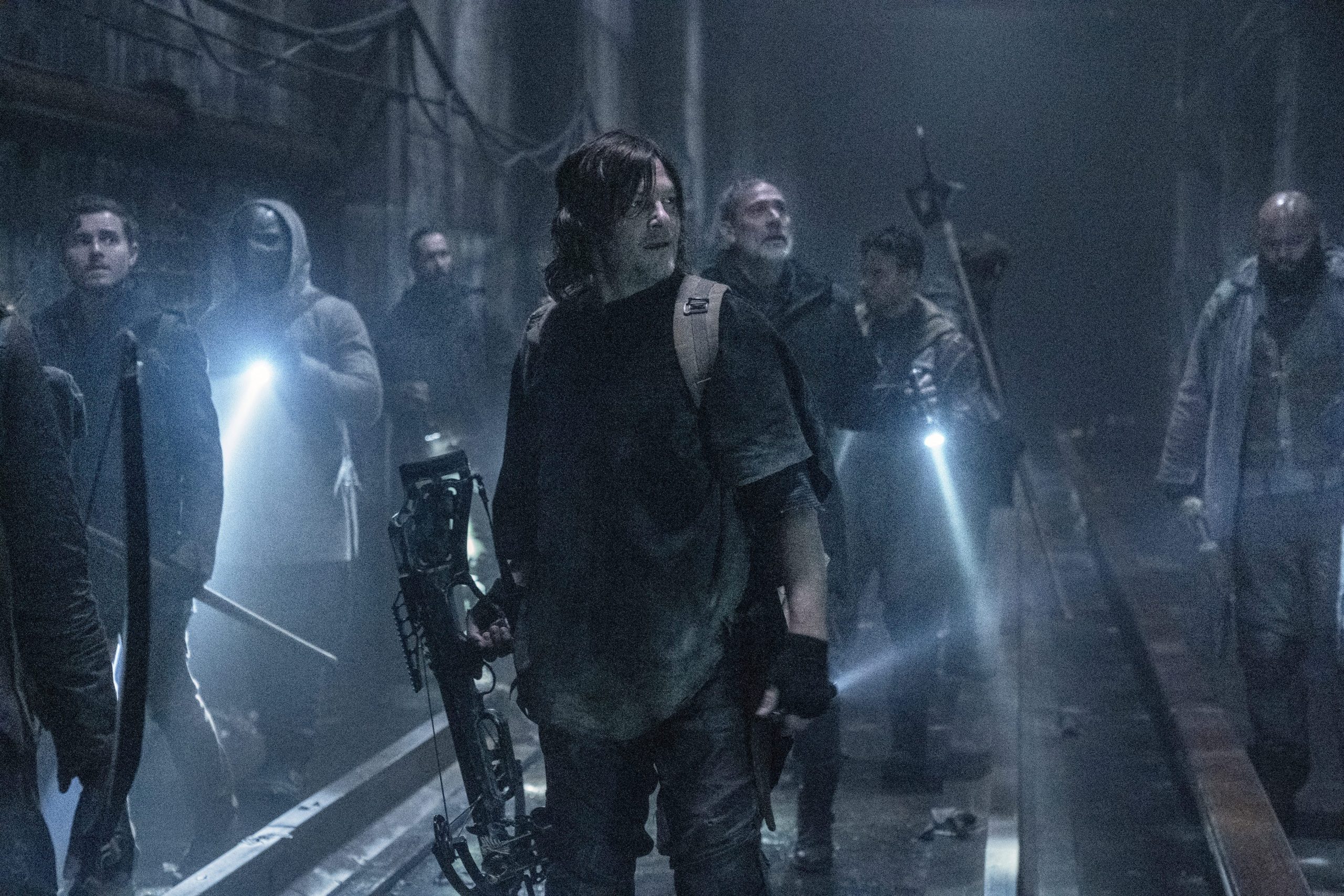 TWD 1101 Norman Reedus as Daryl Dixon in a tunnel