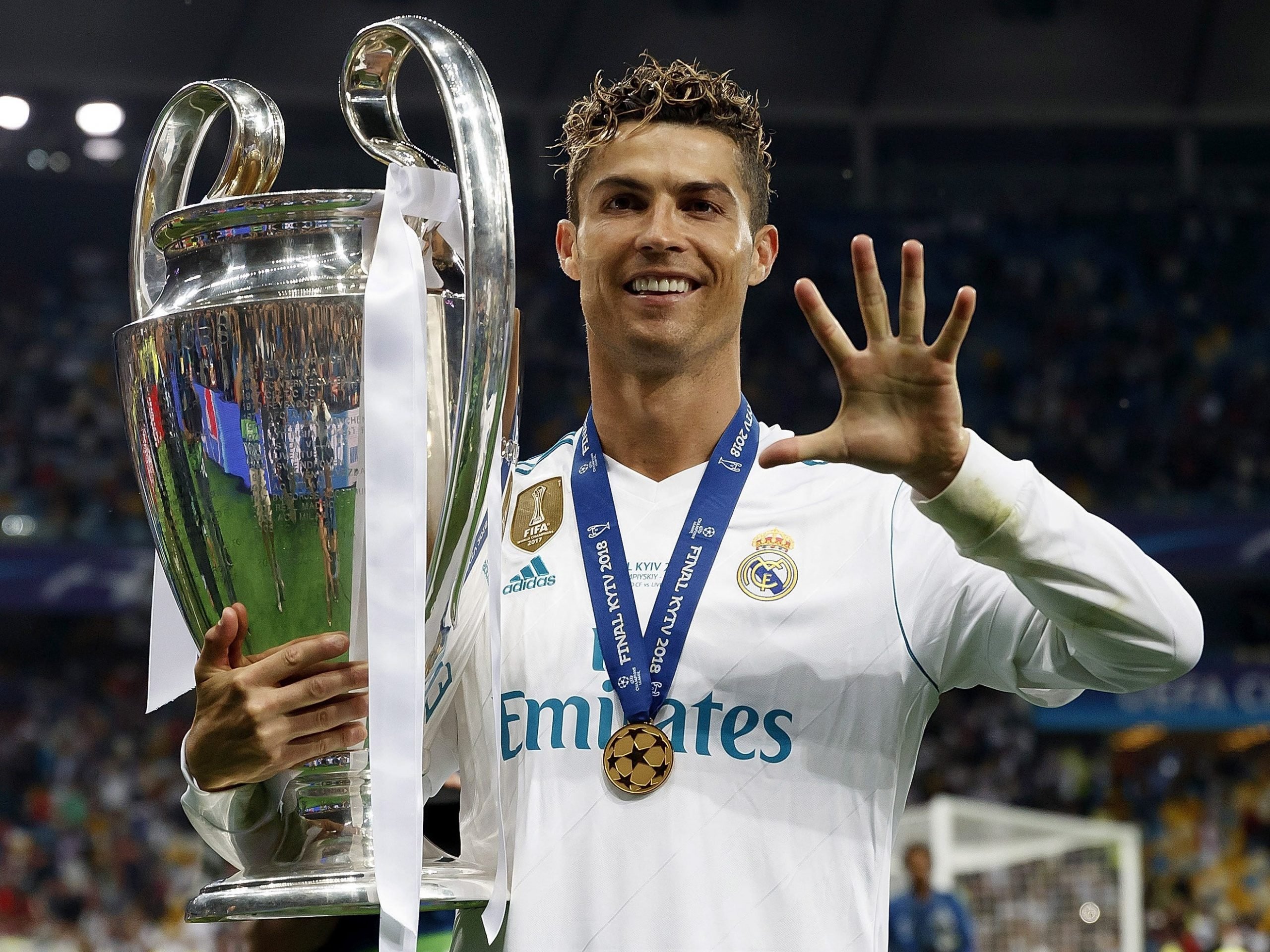 Cristiano Ronaldo holding the Champions League trophy