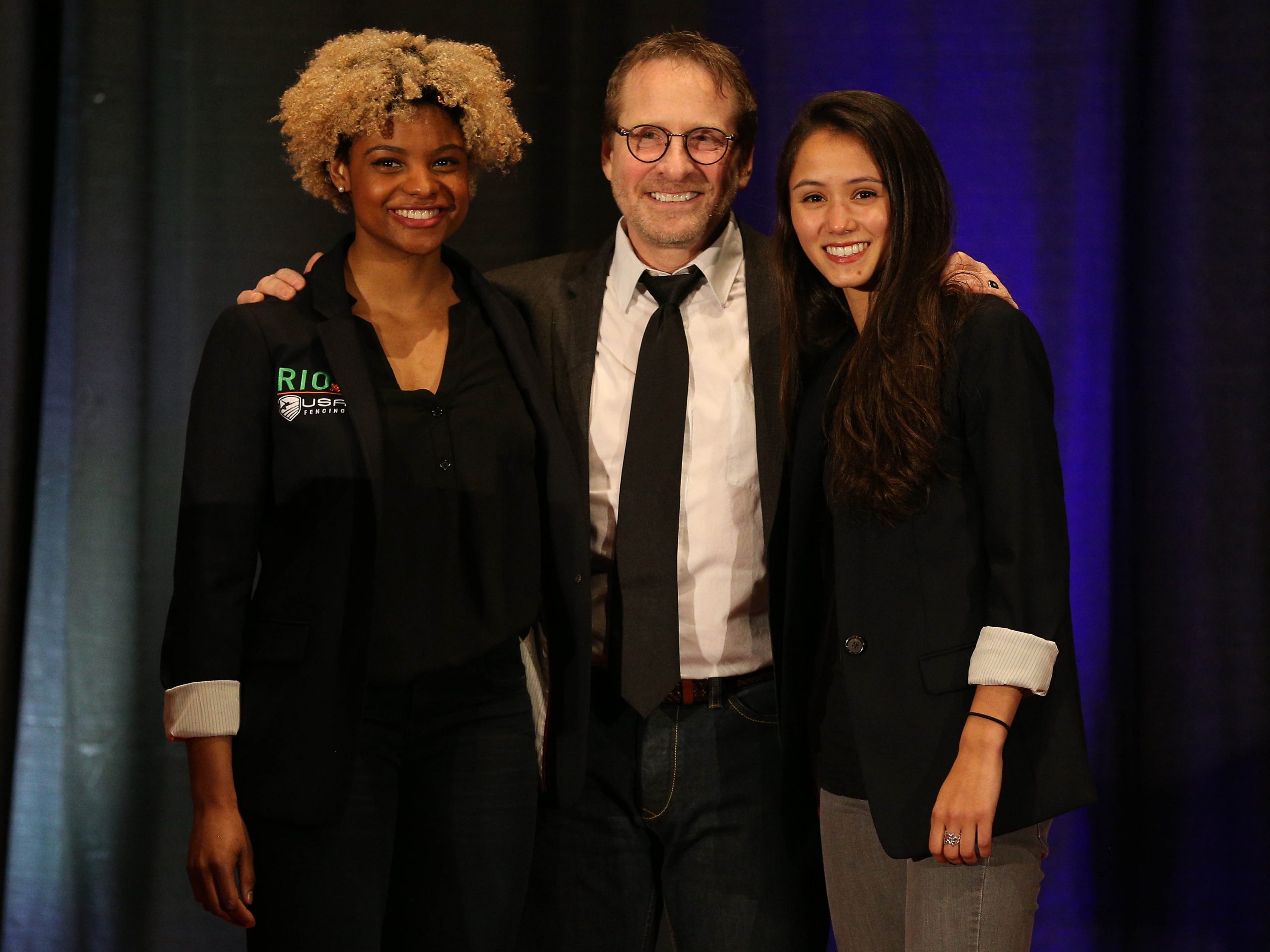 U.S. Women's National Foil Fencing Coach Buckie Leach (center) poses with U.S. Olympic foil fencers Nzingha Prescod (L) and Lee Kiefer (R)