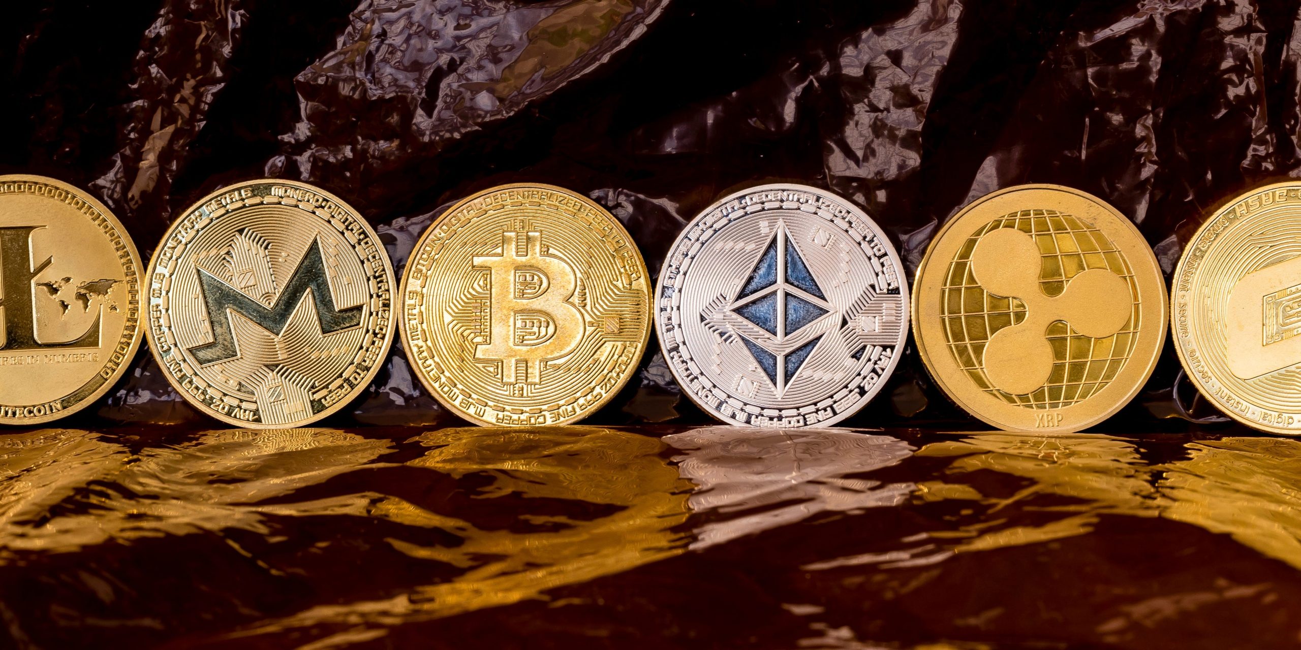 As a visual representation of the digital Cryptocurrency, Litecoin (LTC), Monero (XMR), Bitcoin (BTC), Ethereum (ETH), Ripple (XRP) and Dash on June 15, 2018 in Hong Kong, Hong Kong.