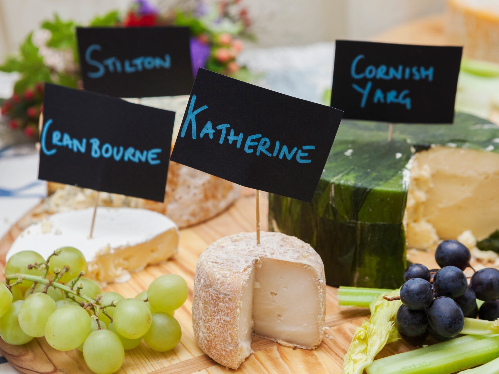 Plate of labelled English cheeses.