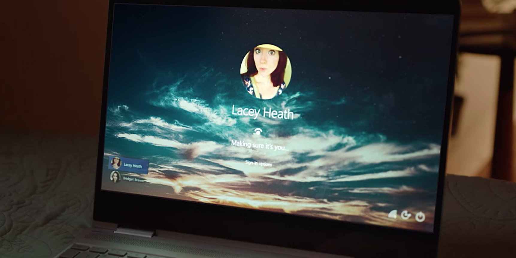 A photo of a Windows Hello sign-in screen verifying a user's identity.