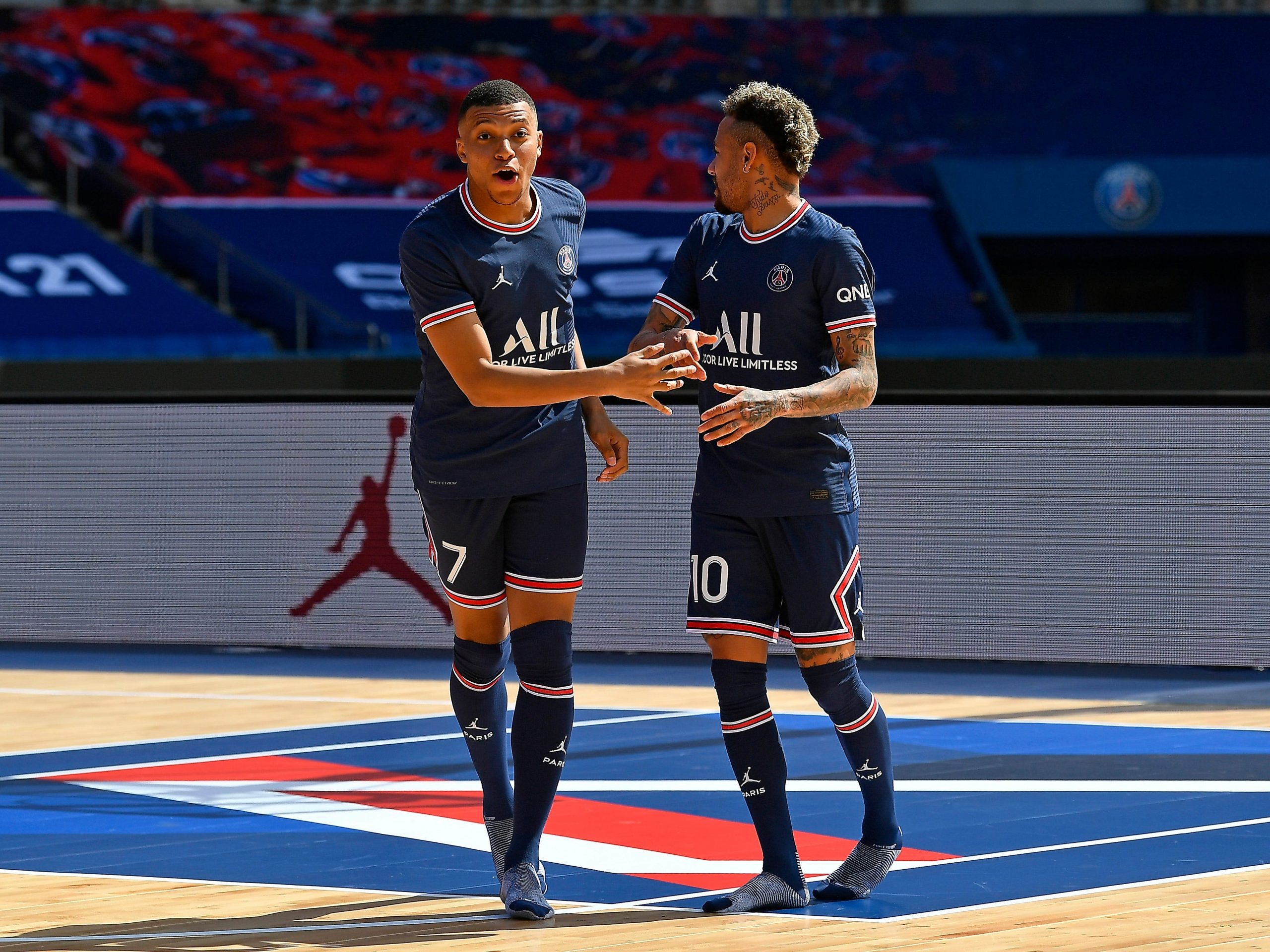 Kylian Mbappe and Neymar Jr react as the Paris Saint-Germain unveils the new Jordan kit