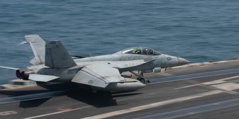 An F/A-18F Super Hornet fighter jet, attached to the “Diamondbacks” of Strike Fighter Squadron (VFA) 102, launches from the flight deck of aircraft carrier USS Ronald Reagan (CVN 76) in the Arabian Sea, Aug. 16