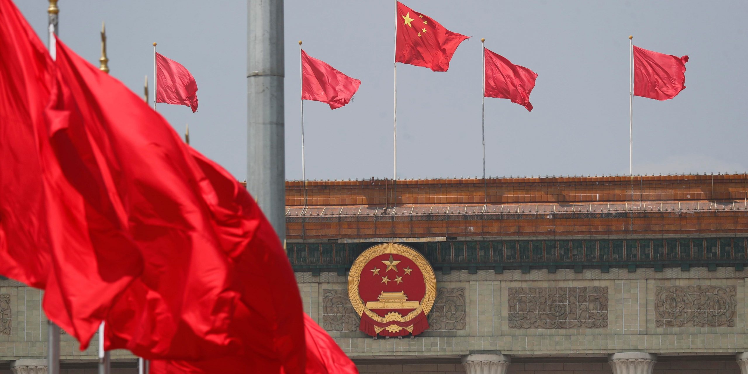 Red flags fly in front of the Great Hall of the People as the third session of the 13th National People's Congress (NPC) holds opening meeting on May 22, 2020 in Beijing, China.