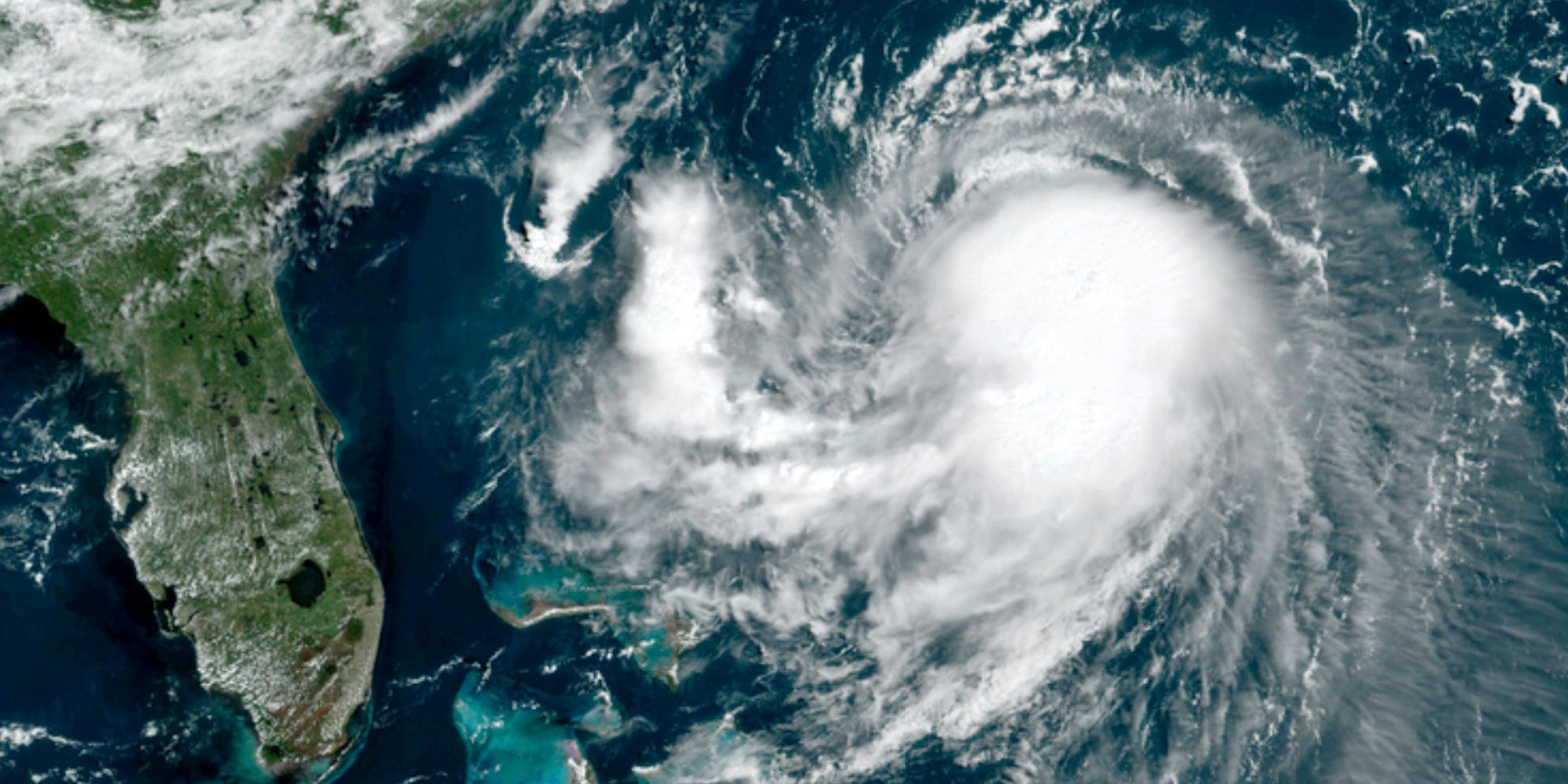 This OES-16 East GeoColor satellite image taken Friday, Aug. 20, 2021, at 11:40 a.m. EDT., and provided by NOAA, shows Tropical Storm Henri in the Atlantic Ocean.