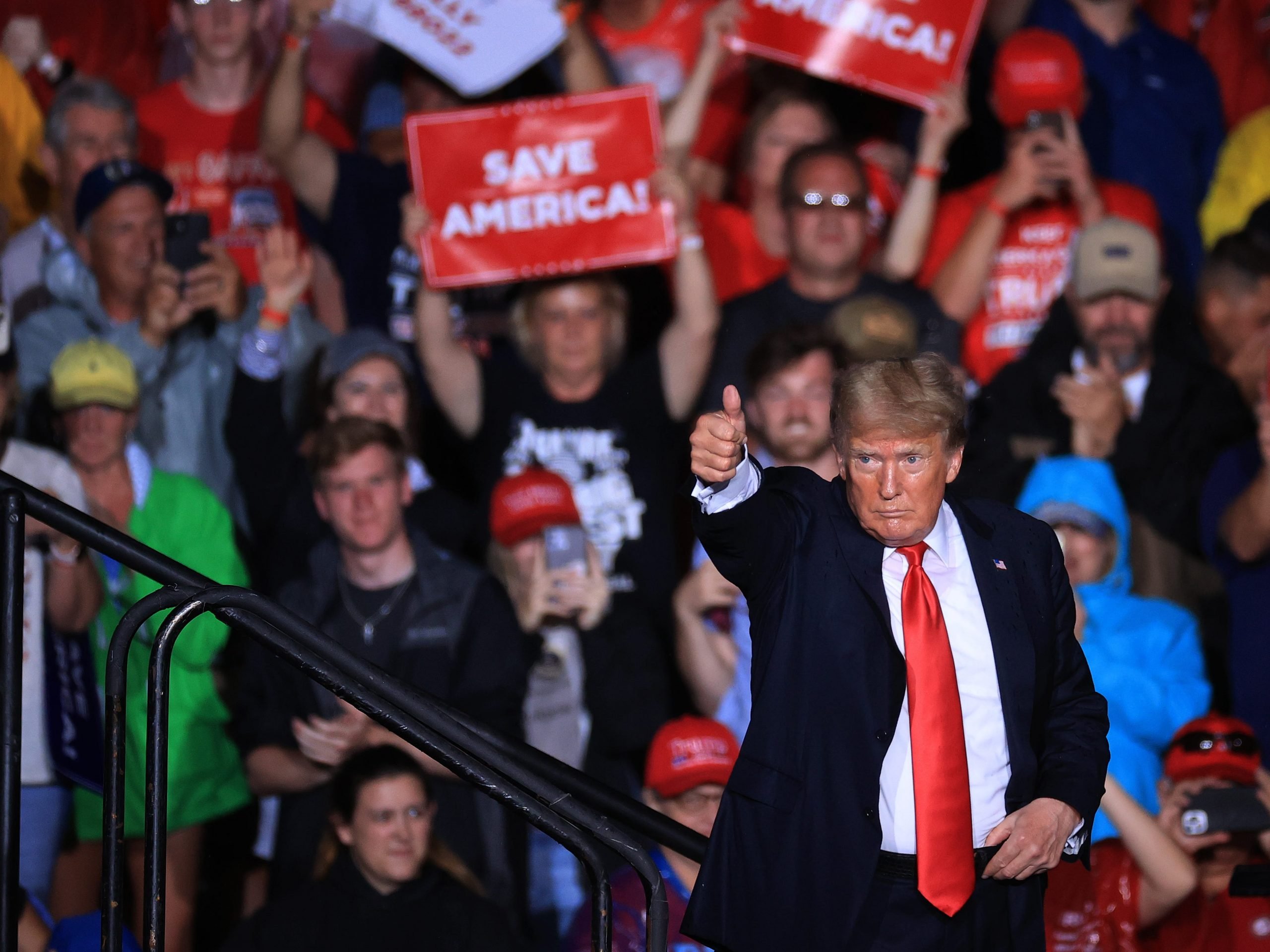 Former U.S. President Donald Trump gives a thumbs-up as he finishes addressing a "Save America" rally at York Family Farms on August 21, 2021 in Cullman, Alabama.