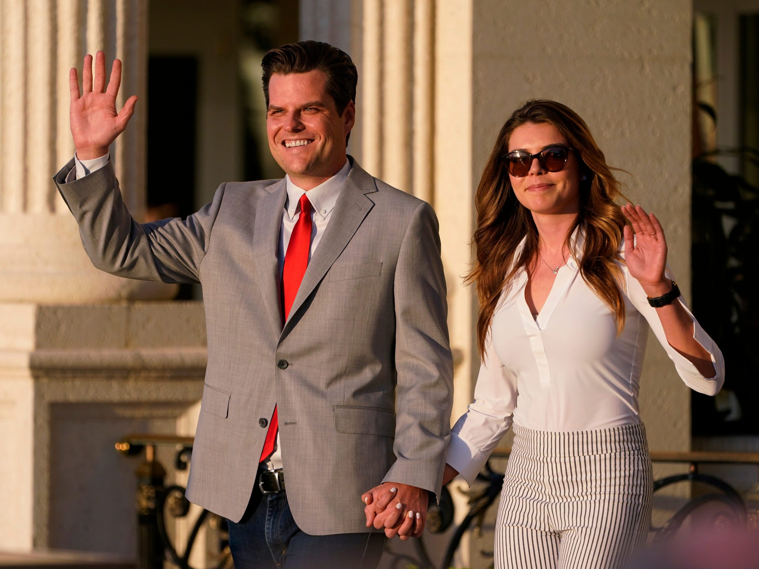 U.S. Rep. Matt Gaetz, R-Fla., and his girlfriend Ginger Luckey enter "Women for American First" event, Friday, April 9, 2021, in Doral, Fla.