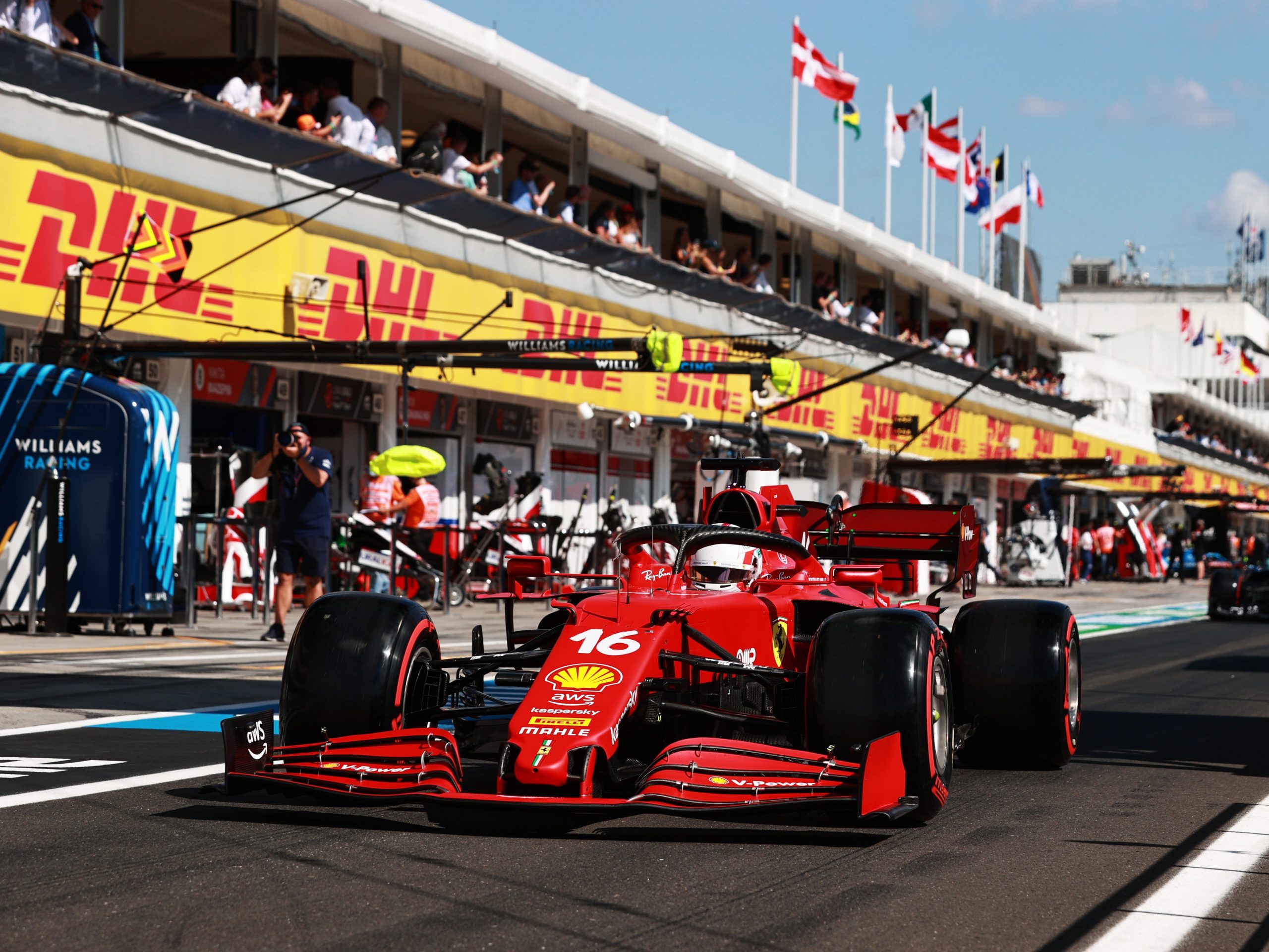 Charles Leclerc drives through the pits at the Hungarian Grand Prix