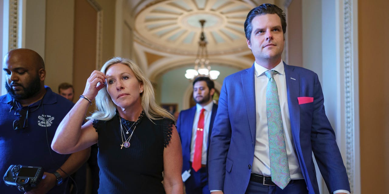 Rep. Marjorie Taylor Greene, R-Ga., left, and Rep. Matt Gaetz, R-Fla., return to the House after walking to the Senate chamber with other conservatives, to express their opposition to new mask guidance, at the Capitol in Washington, Thursday, July 29, 2021.