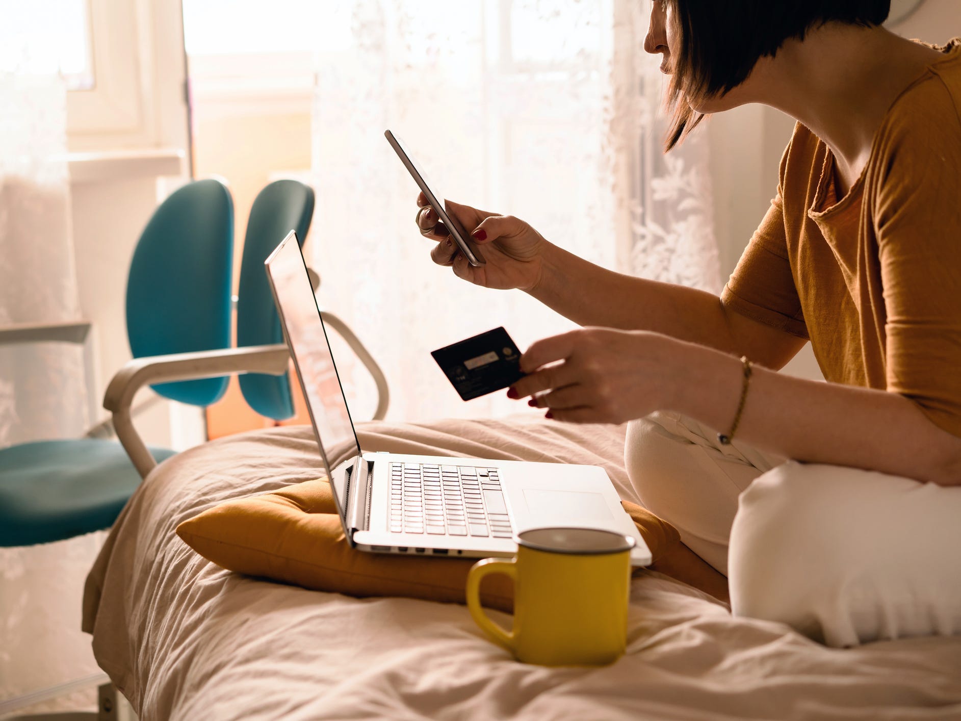 woman shopping online using laptop