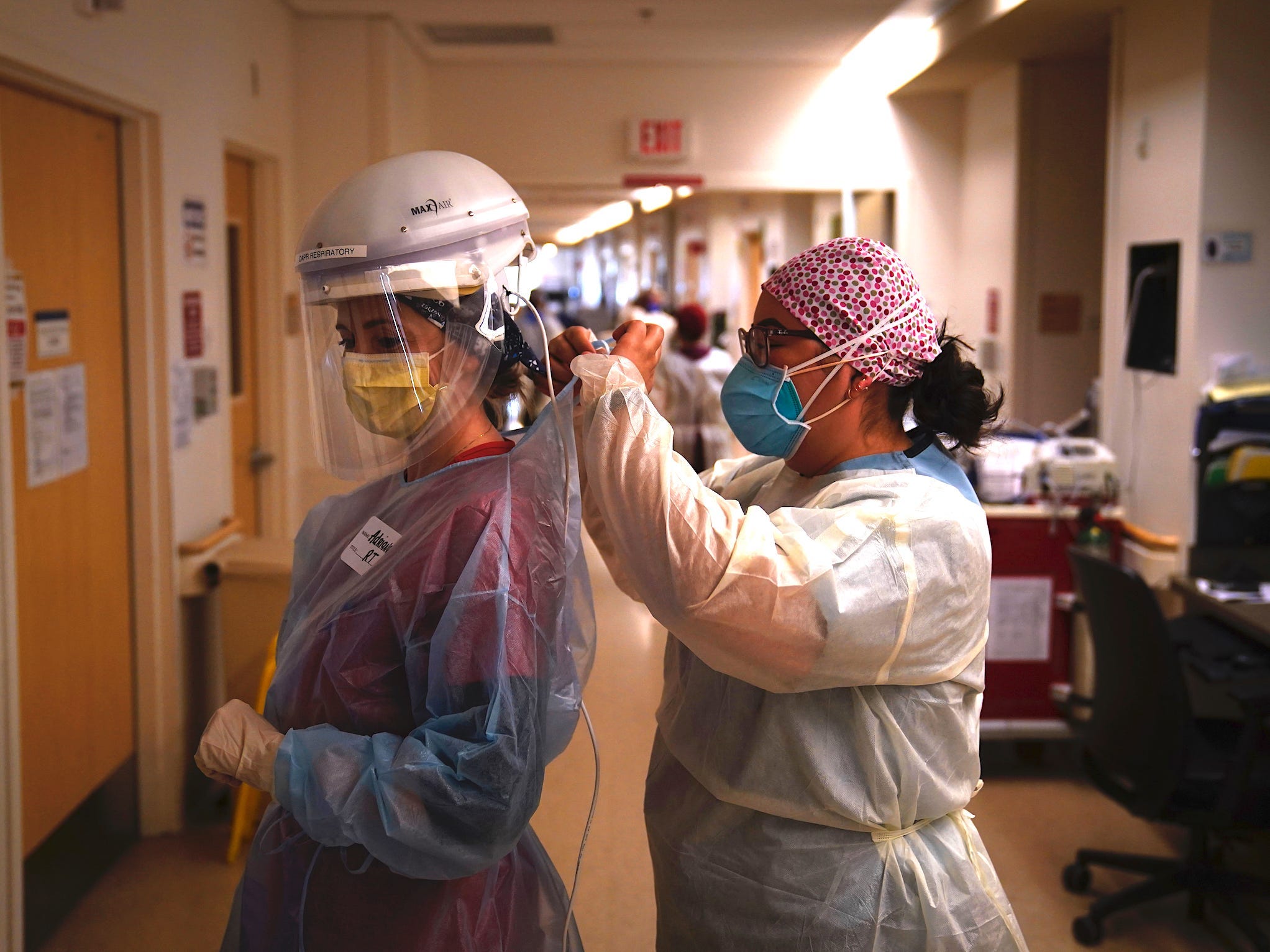 nurses covid coronavirus ppe donning hospital contrast edited for thumb