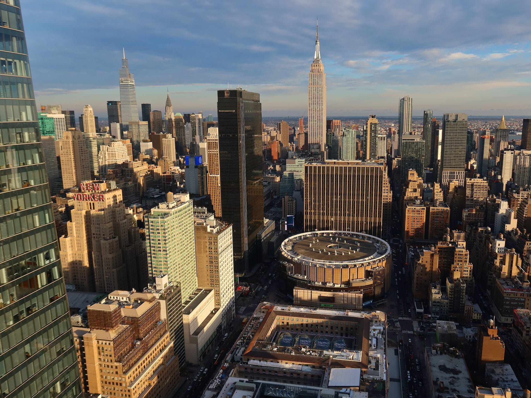 The skyline of midtown Manhattan in New York City as the sun sets