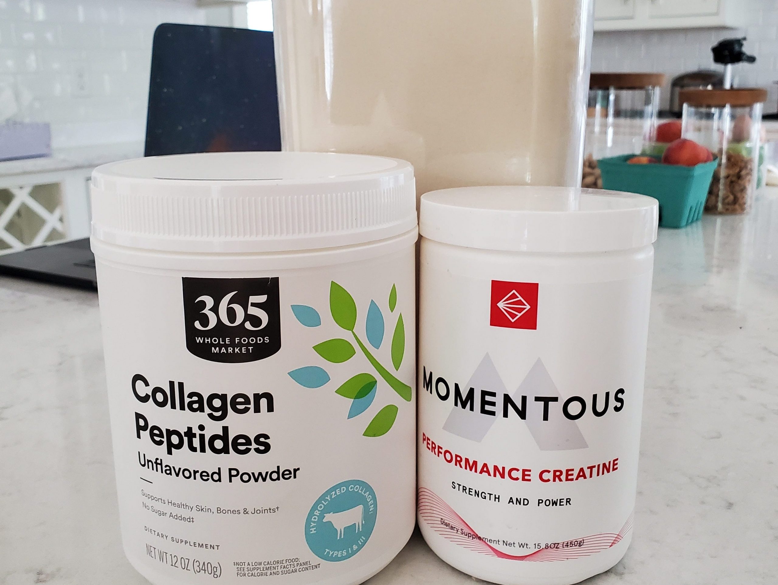 collagen and protein powders on a kitchen counter