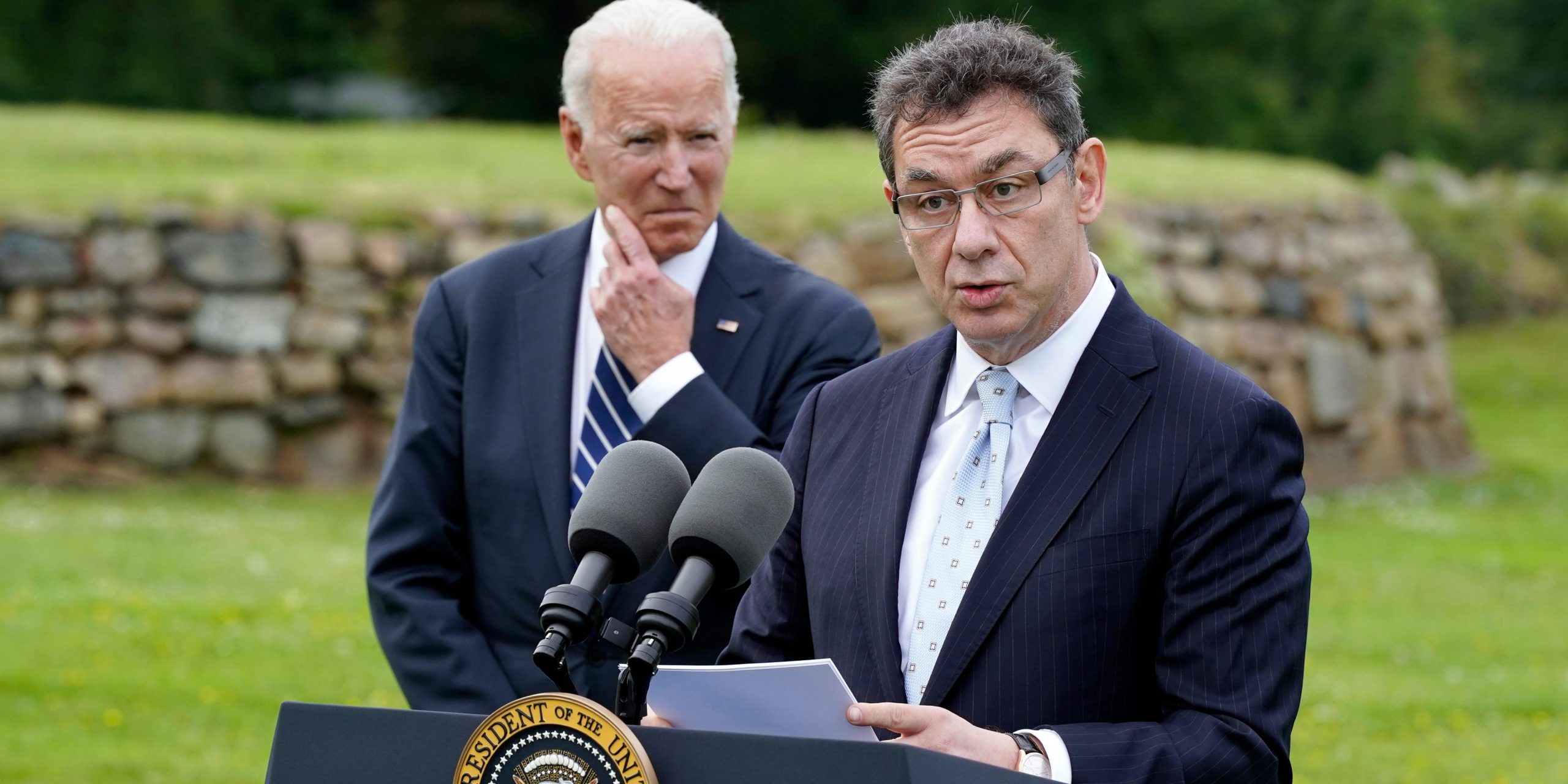 President Joe Biden listens as Pfizer CEO Albert Bourla speaks Thursday, June 10, 2021, in St. Ives, England. Biden spoke about his administration's global COVID-19 vaccination efforts ahead of the G-7 summit.