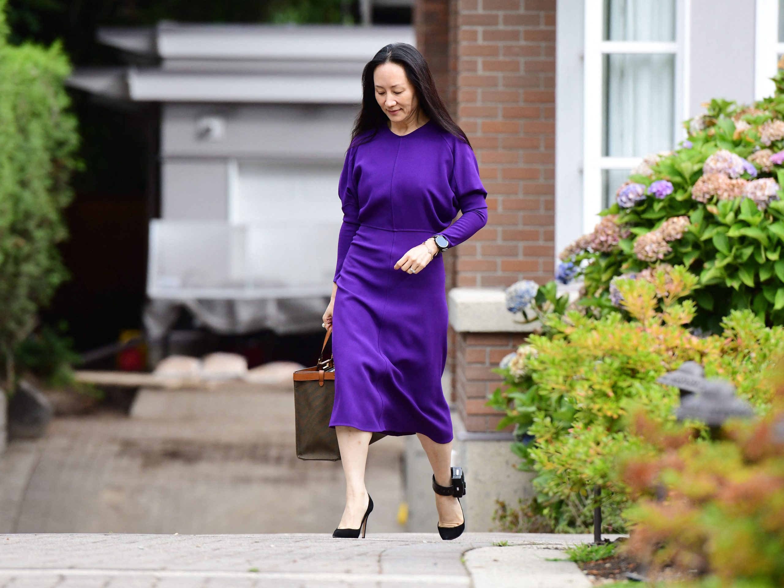 Huawei Chief Financial Officer Meng Wanzhou leaves her Vancouver home to attend her last extradition hearing in British Columbia Supreme Court, on August 18, 2021 in Vancouver, Canada.