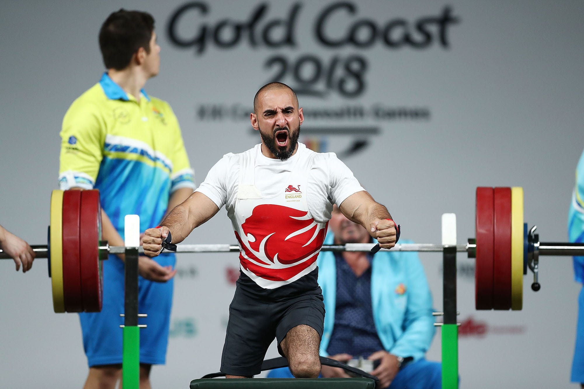 Ali Jawad of England celebrates a lift in the Men's Lightweight Final during the Para Powerlifting on day six of the Gold Coast 2018 Commonwealth Games