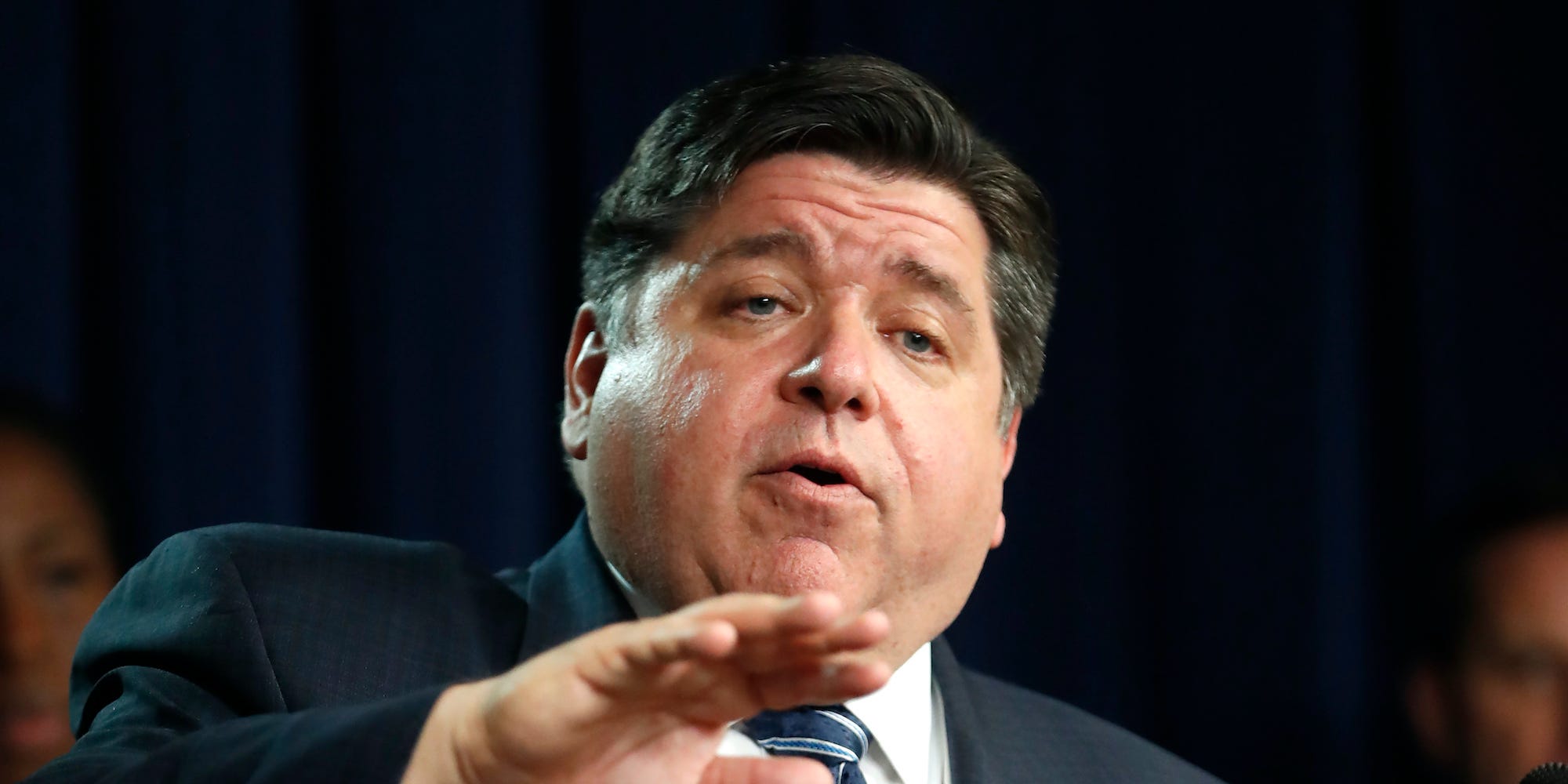 Illinois Gov. J.B. Pritzker responds to a question after announcing that three more people have died in the state from from Covid-19 virus, two Illinois residents and one woman visiting from Florida, during a news conference Thursday, March 19, 2020, in Chicago.