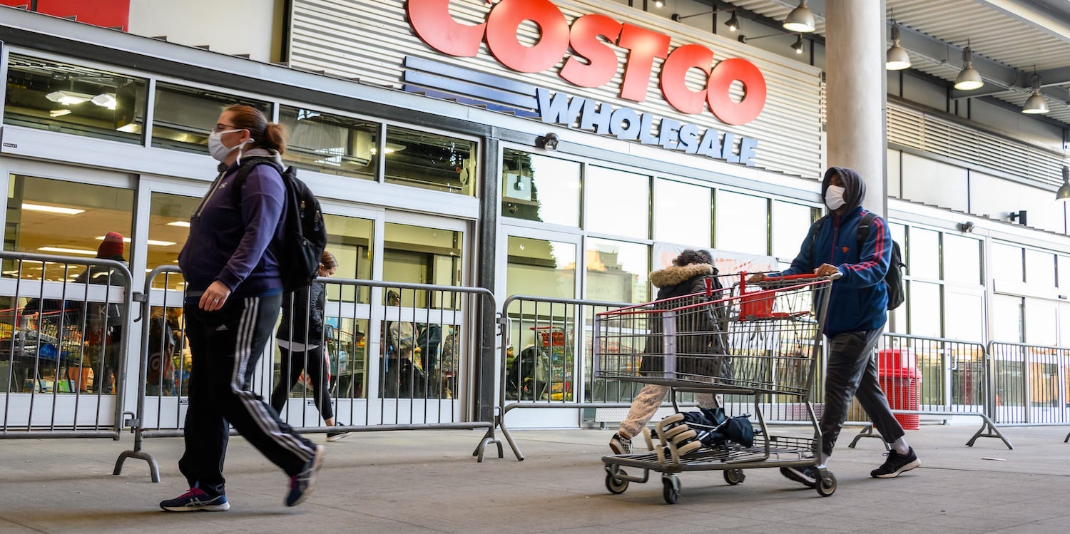 Costco shoppers outside one of its stores