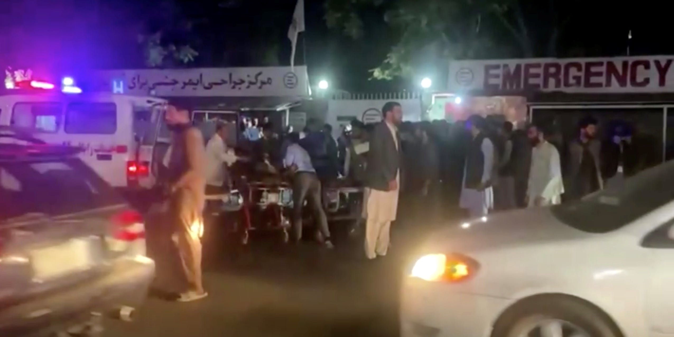 A screen grab shows people outside a hospital after an attack at Kabul airport, in Kabul, Afghanistan August 26, 2021.