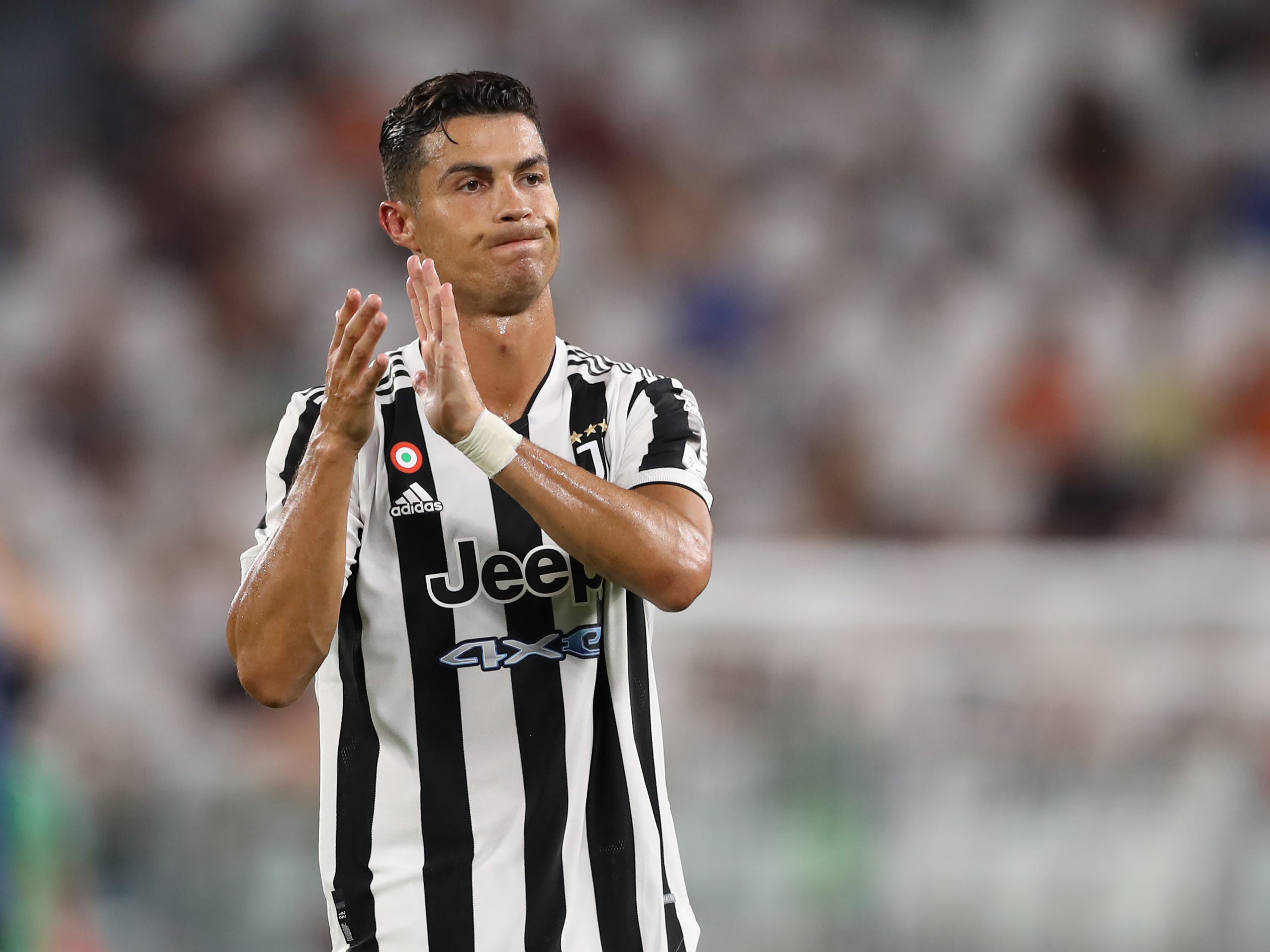 Cristiano Ronaldo claps during a Juventus game