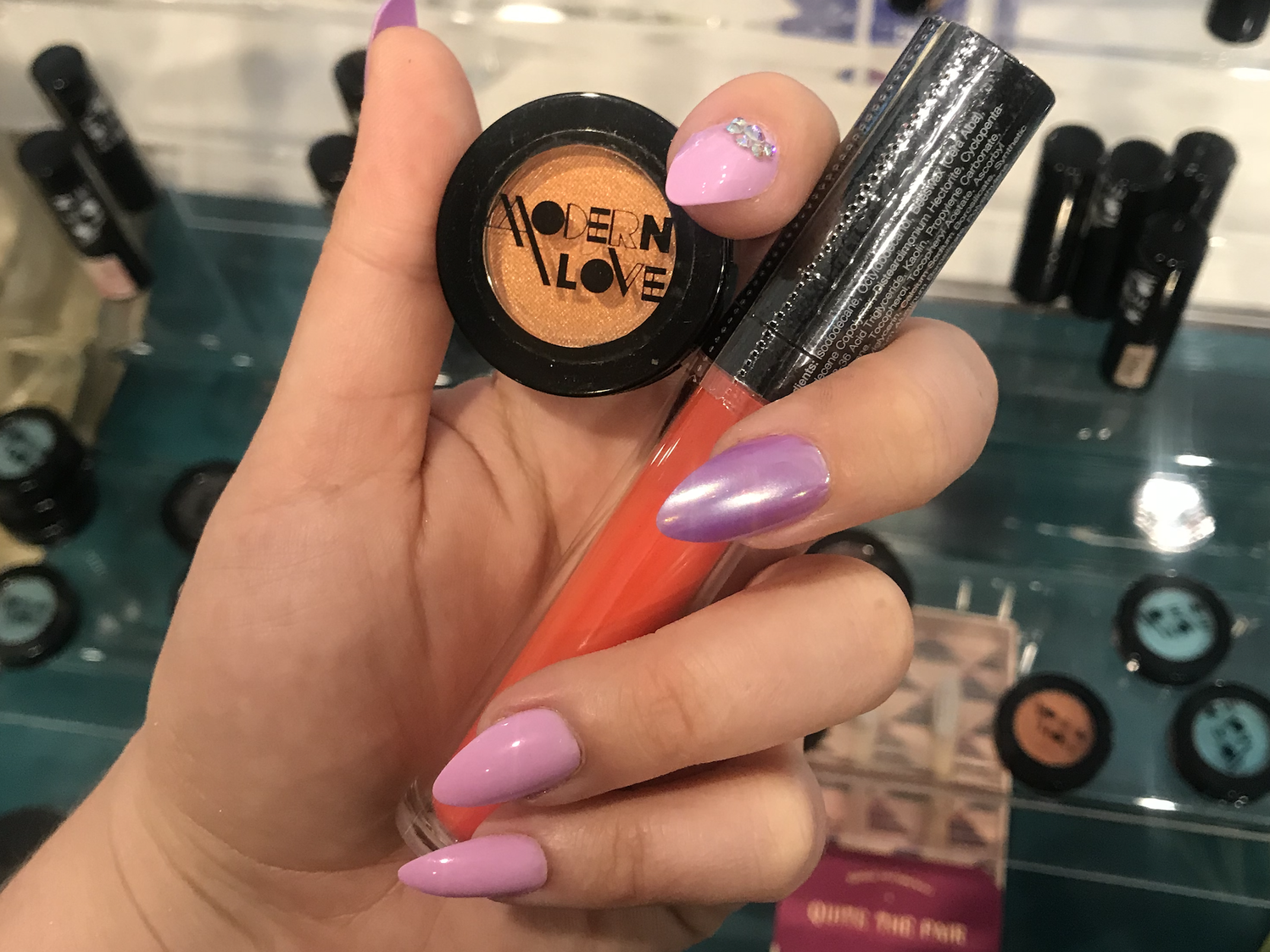 hand holding makeup from modern love in providence rhode island