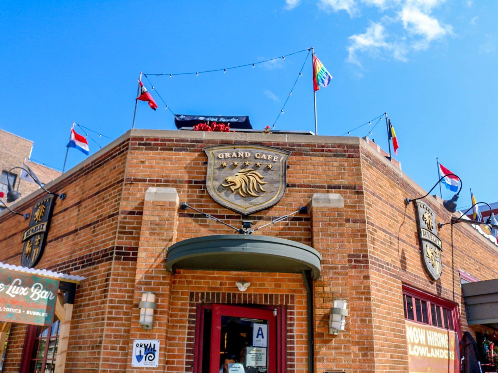 Street view of Café Benelux's brown brick building