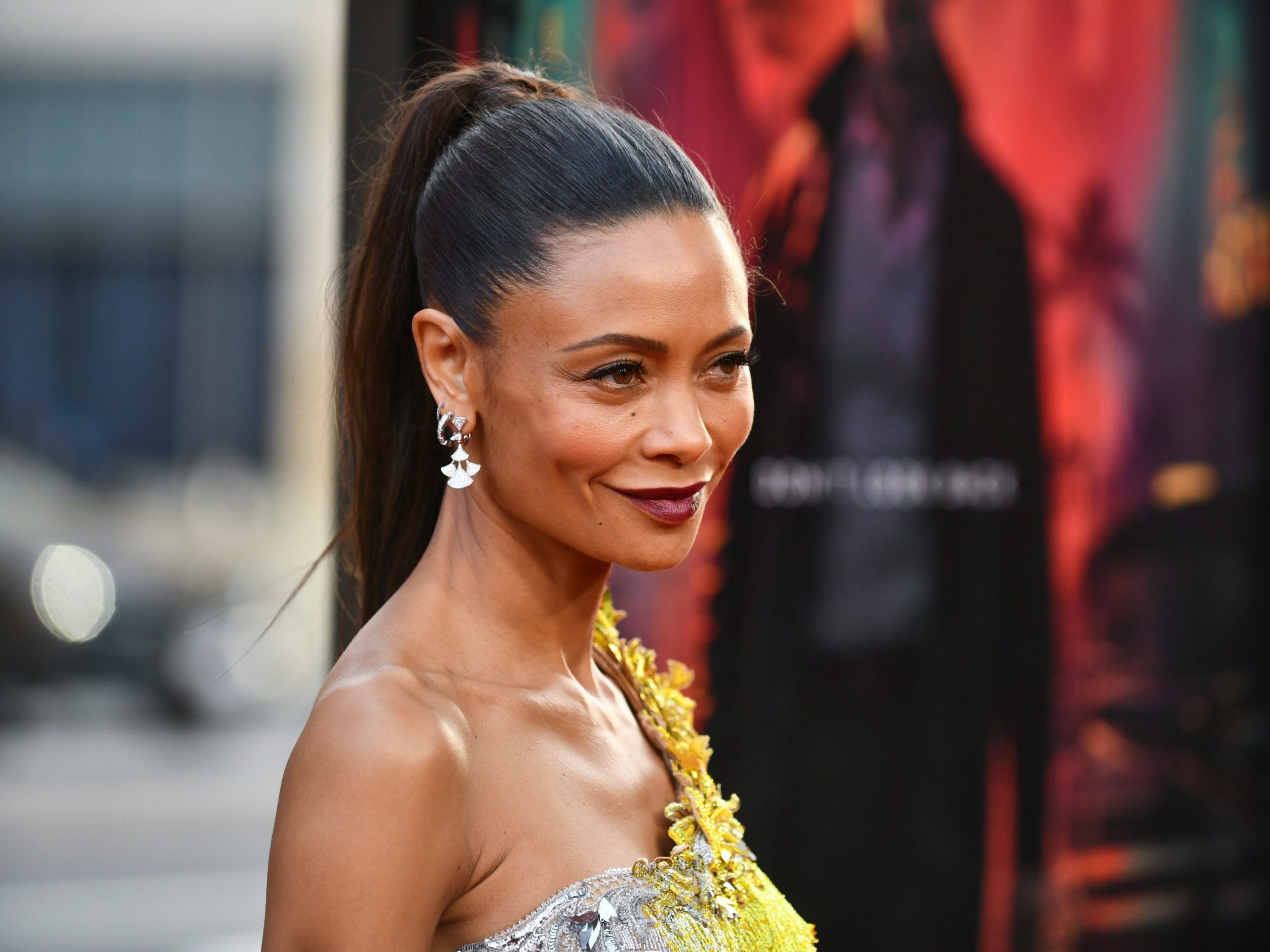 Thandiwe Newton in a yellow dress