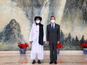 Taliban-leider Abdul Ghani Baradar ontmoette de Chinese minister van Buitenlandse Zaken in juli.