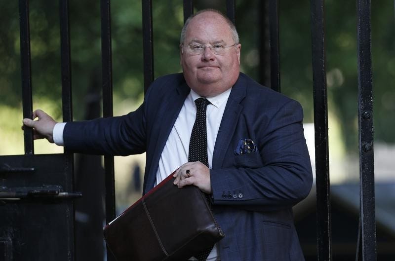 Britain's Communities Secretary Eric Pickles arrives for a cabinet meeting at Number 10 Downing Street in London August 29, 2013.  REUTERS/Suzanne Plunkett