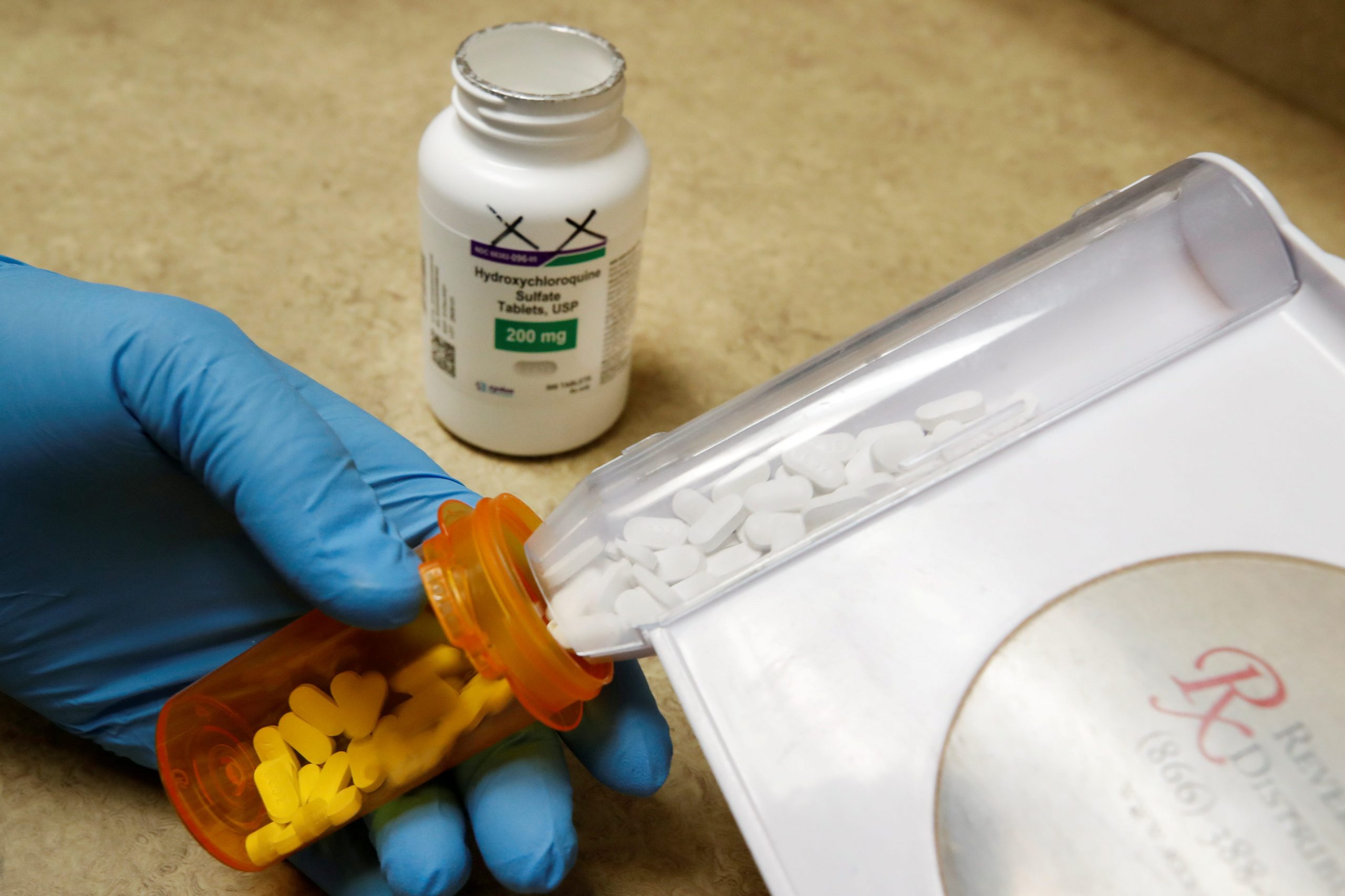 FILE PHOTO: The drug hydroxychloroquine is displayed by a pharmacist at a pharmacy in Provo, Utah, U.S., May 27, 2020. REUTERS/George Frey/File Photo