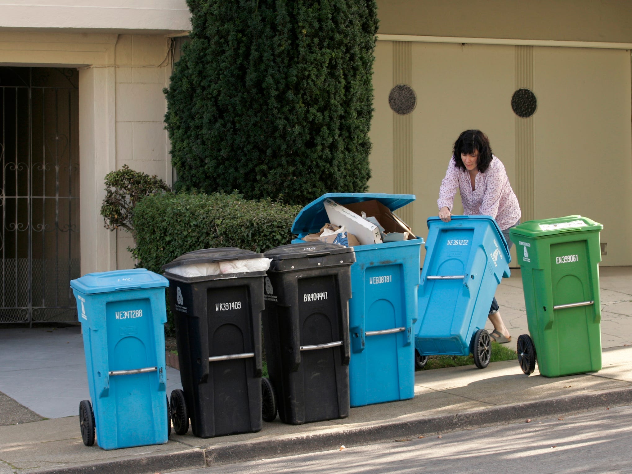 recycling blue bins garbage curb