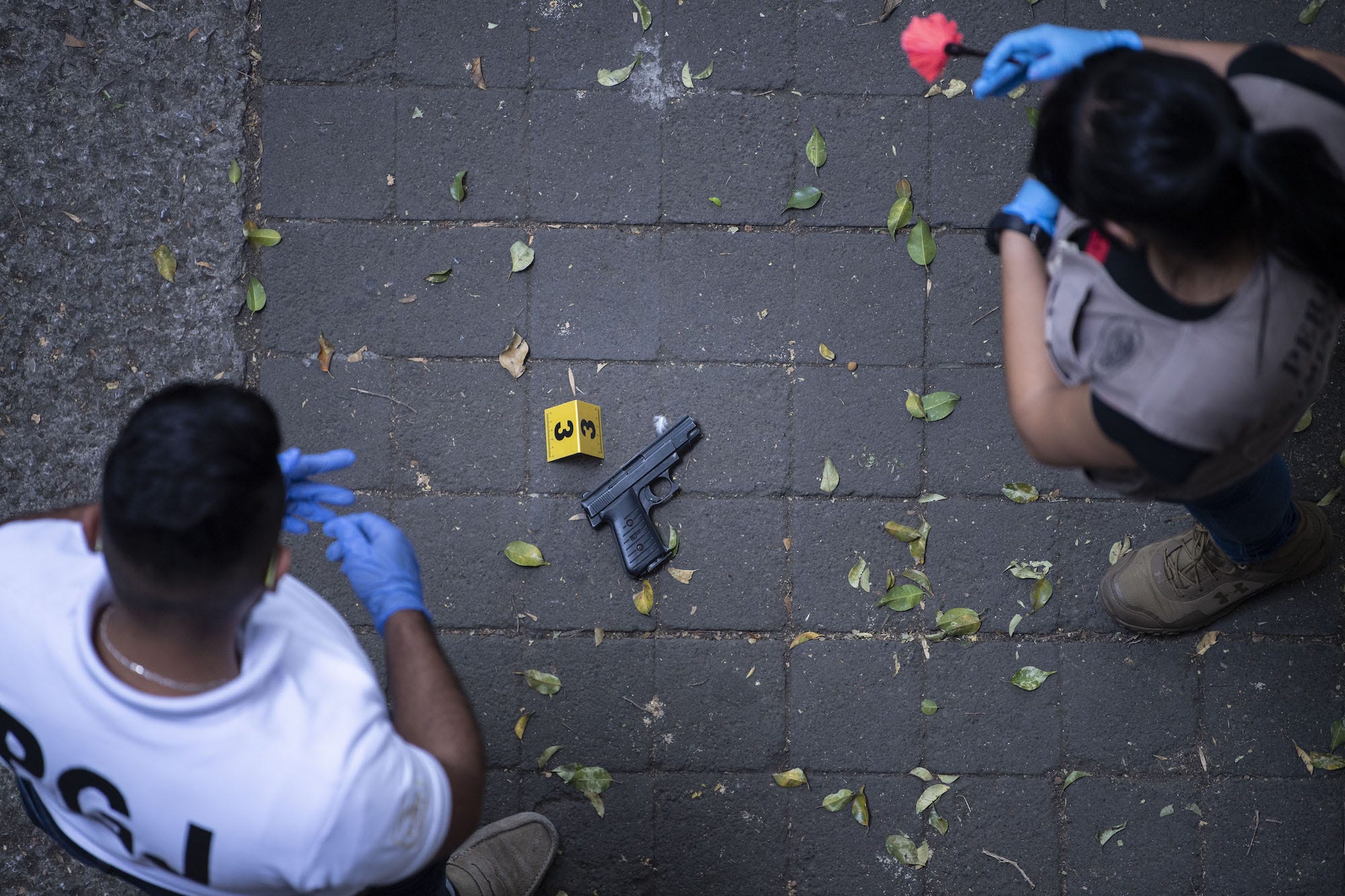 Mexico City forensic crime scene gun