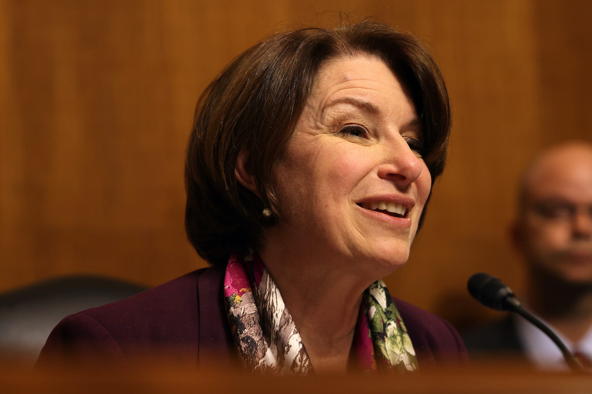 senator Amy Klobuchar smiles during a tech hearing