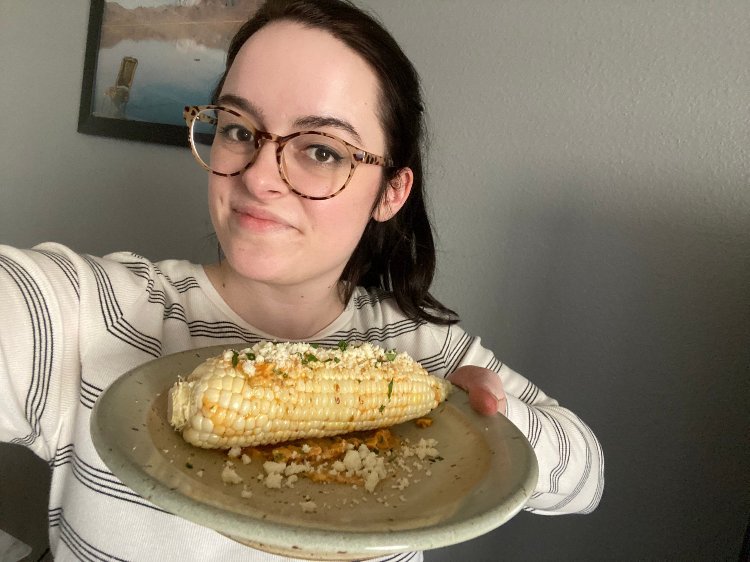 Paige Bennett with corn on the cob.